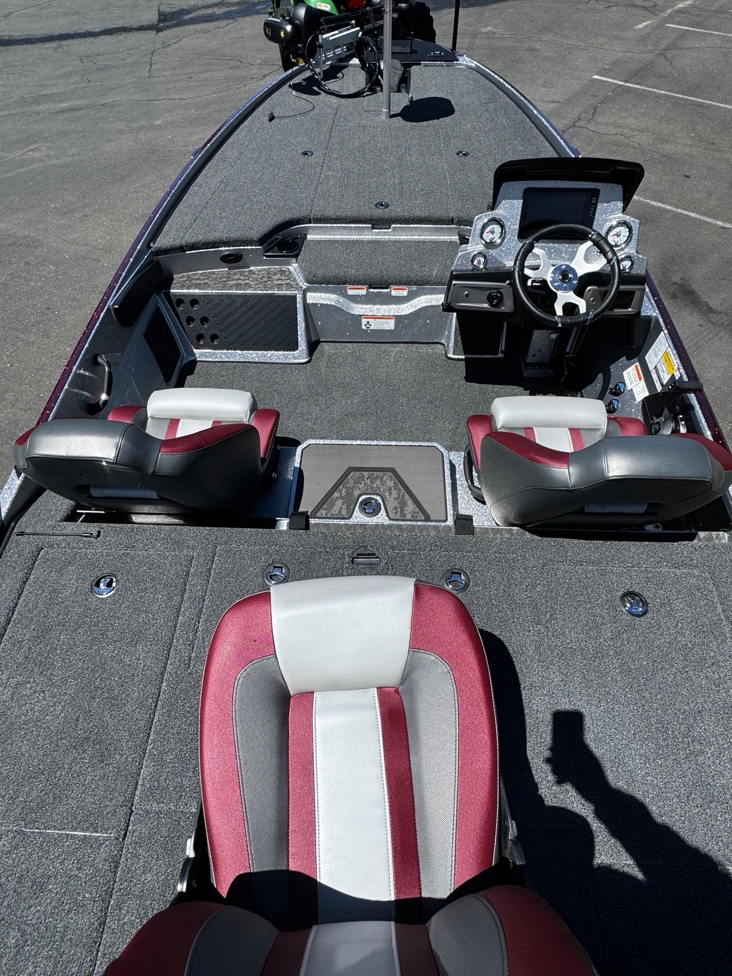 2025 Nitro Z20 XL Pro boat interior with modern seating and steering console.
