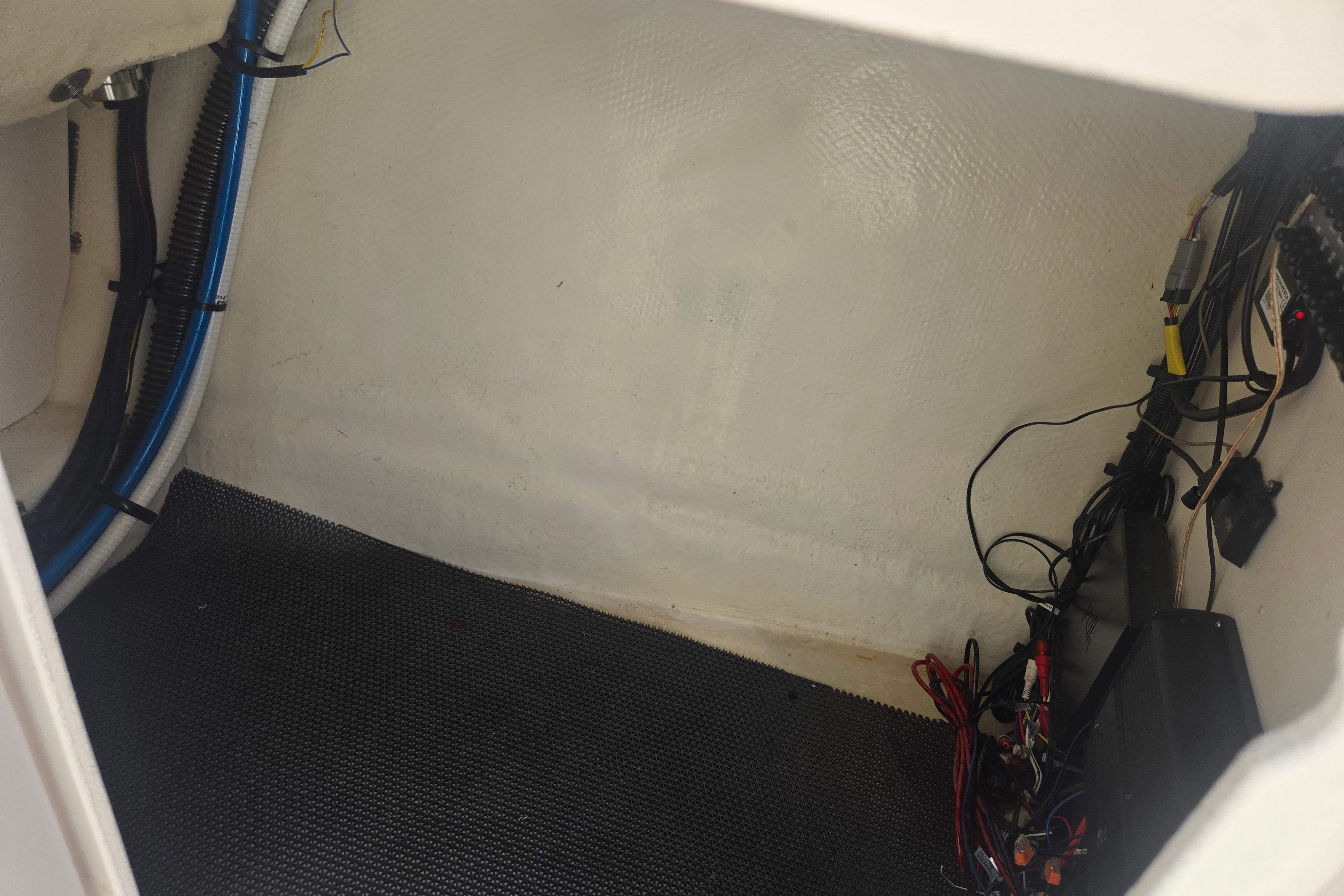 Interior wiring and components of a 2018 Chaparral 267 SSX boat.