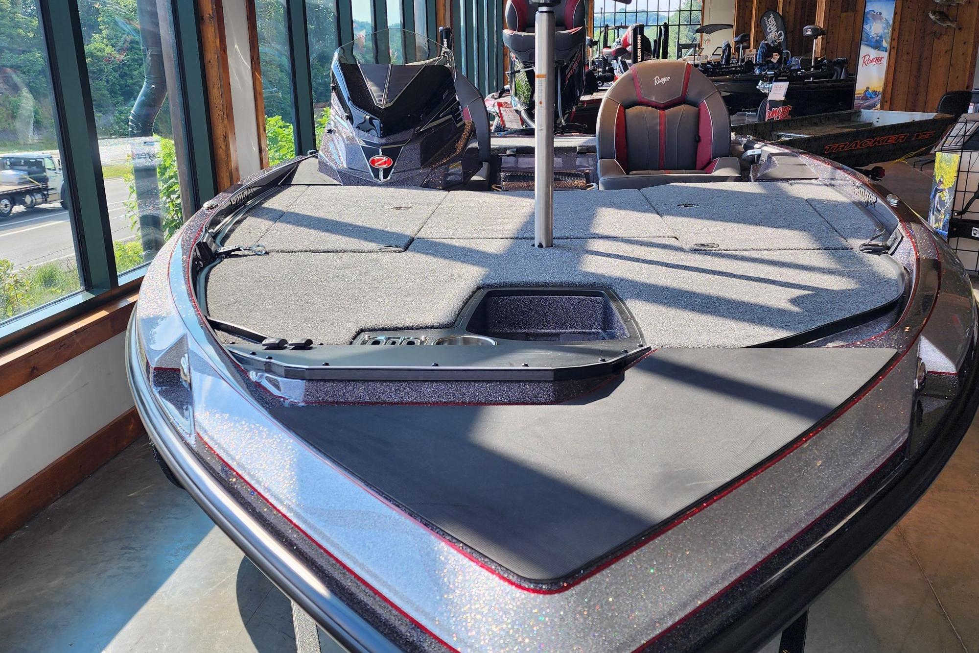 2026 Ranger Z519R boat displayed indoors, featuring sleek design and modern seating.