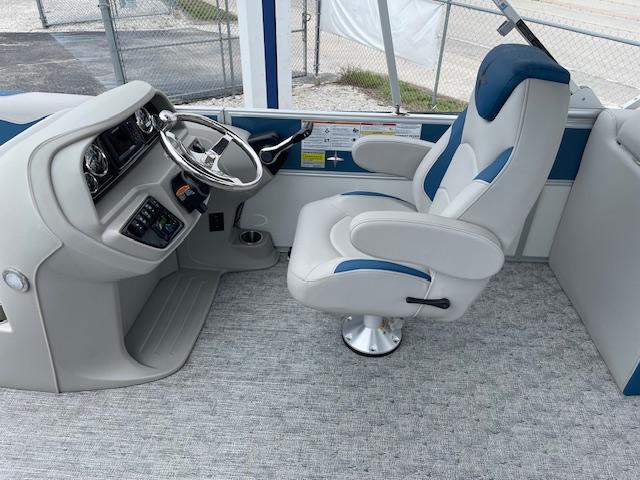 Captain's chair and helm of 2025 Berkshire 22 RFX LE Tri-toon Pontoon.