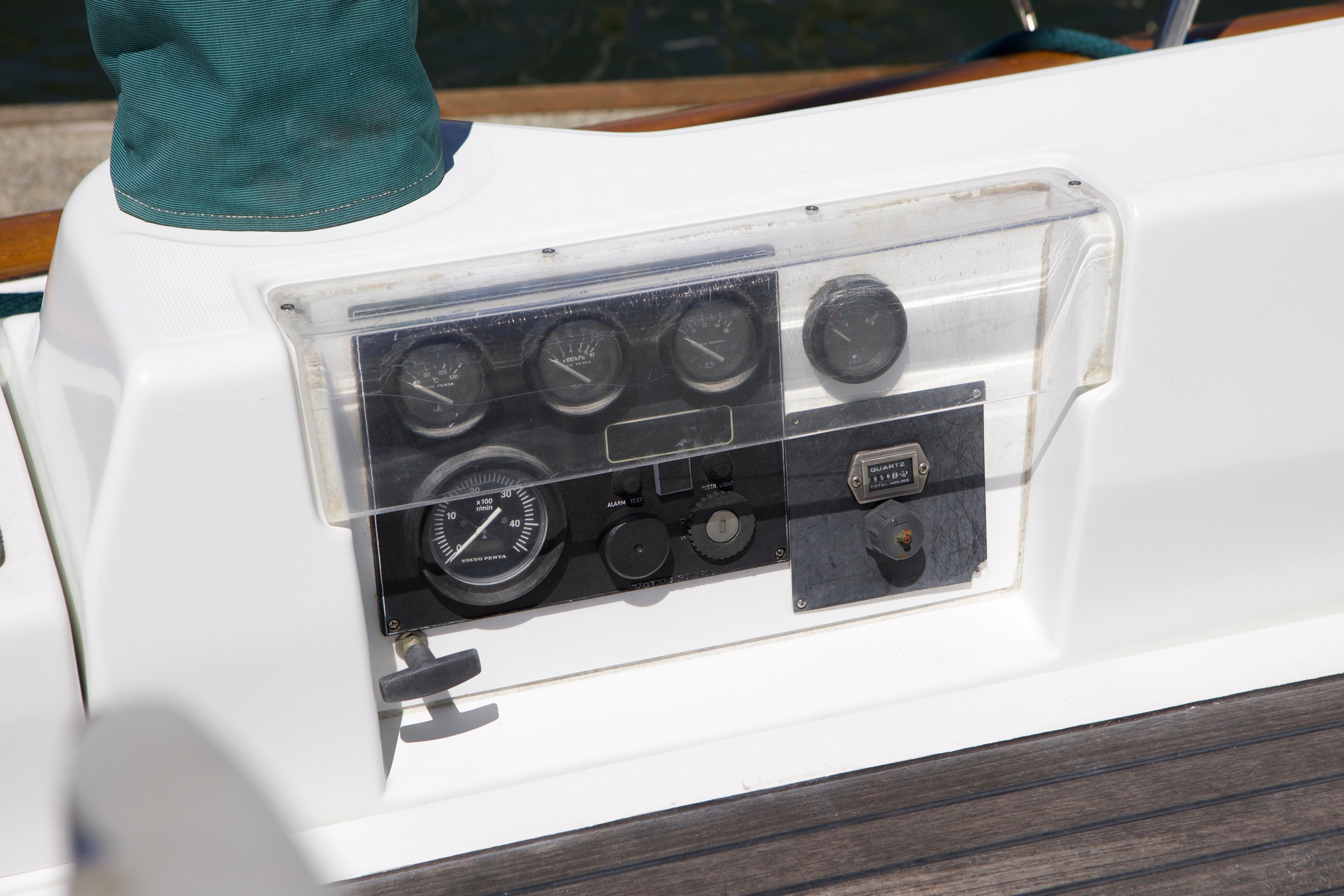 Control panel of a 2005 Beneteau 423 sailboat with gauges and switches.