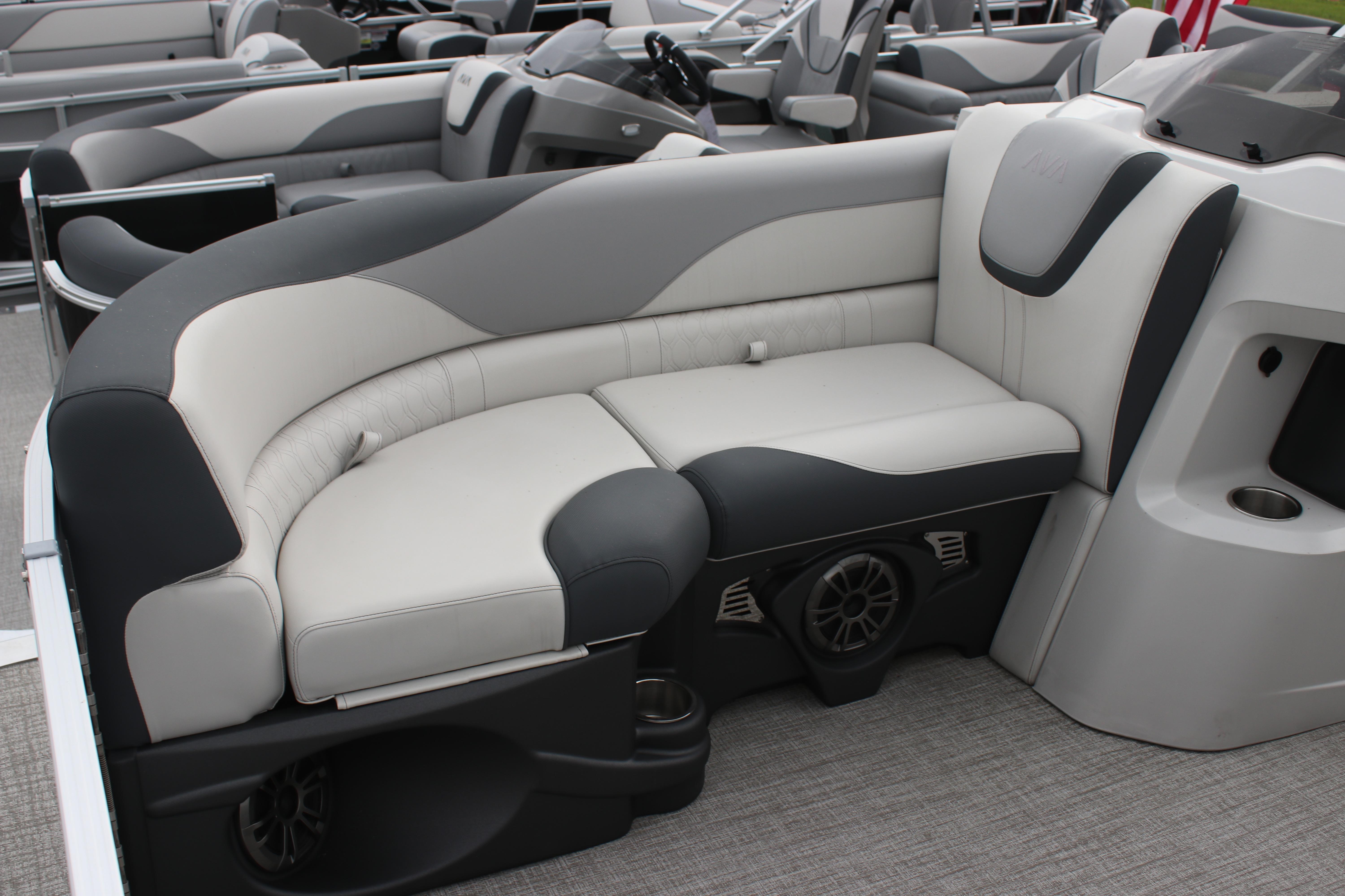 Luxurious seating on 2025 Avalon LSZ Quad Lounger pontoon boat, featuring sleek design and comfort.