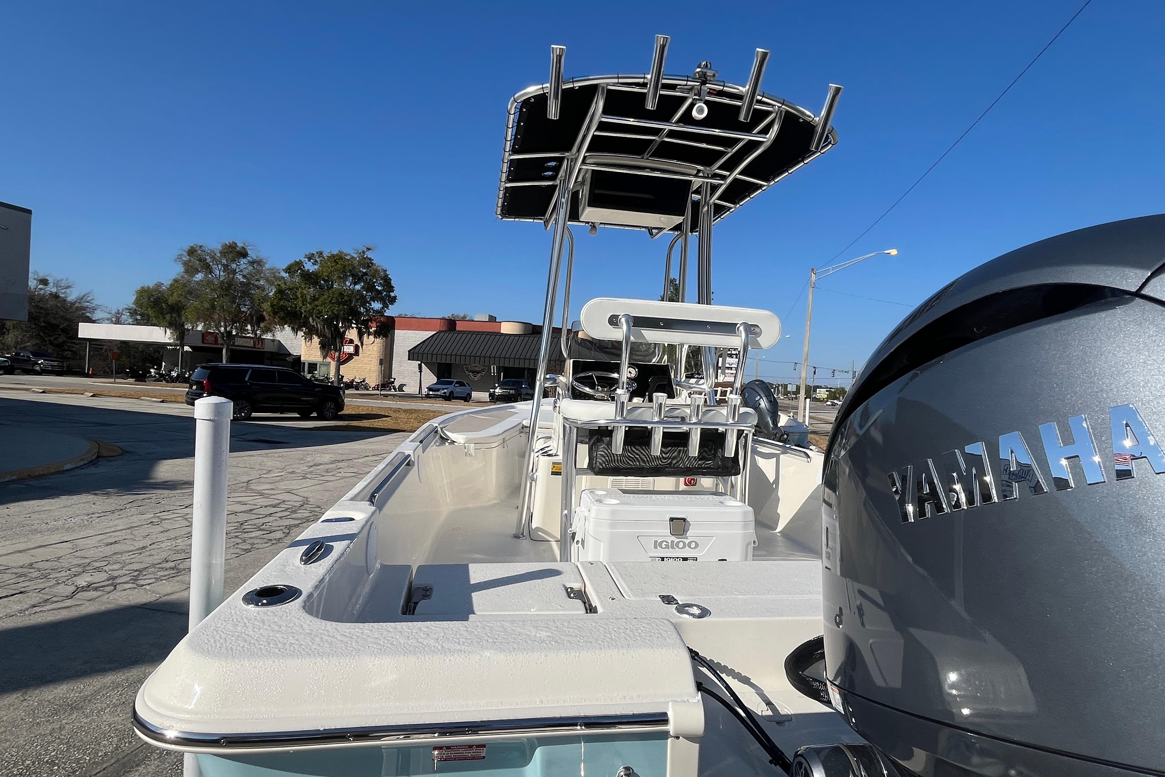 2026 Bulls Bay 2200 boat with Yamaha engine, parked outdoors under clear blue sky.