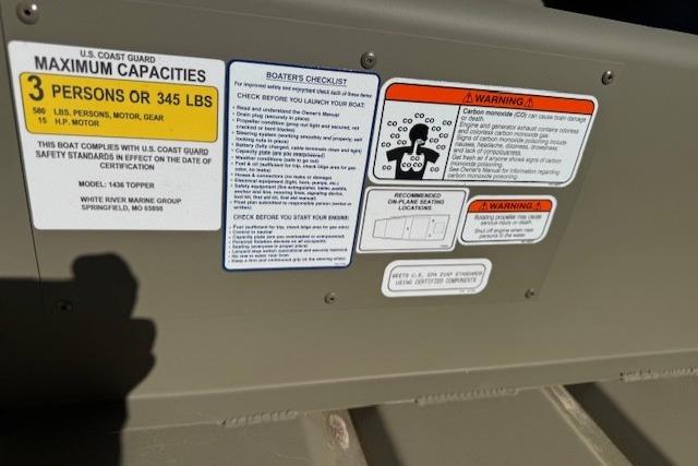 2026 Tracker Grizzly 14 Jon boat safety and capacity labels, including U.S. Coast Guard guidelines.