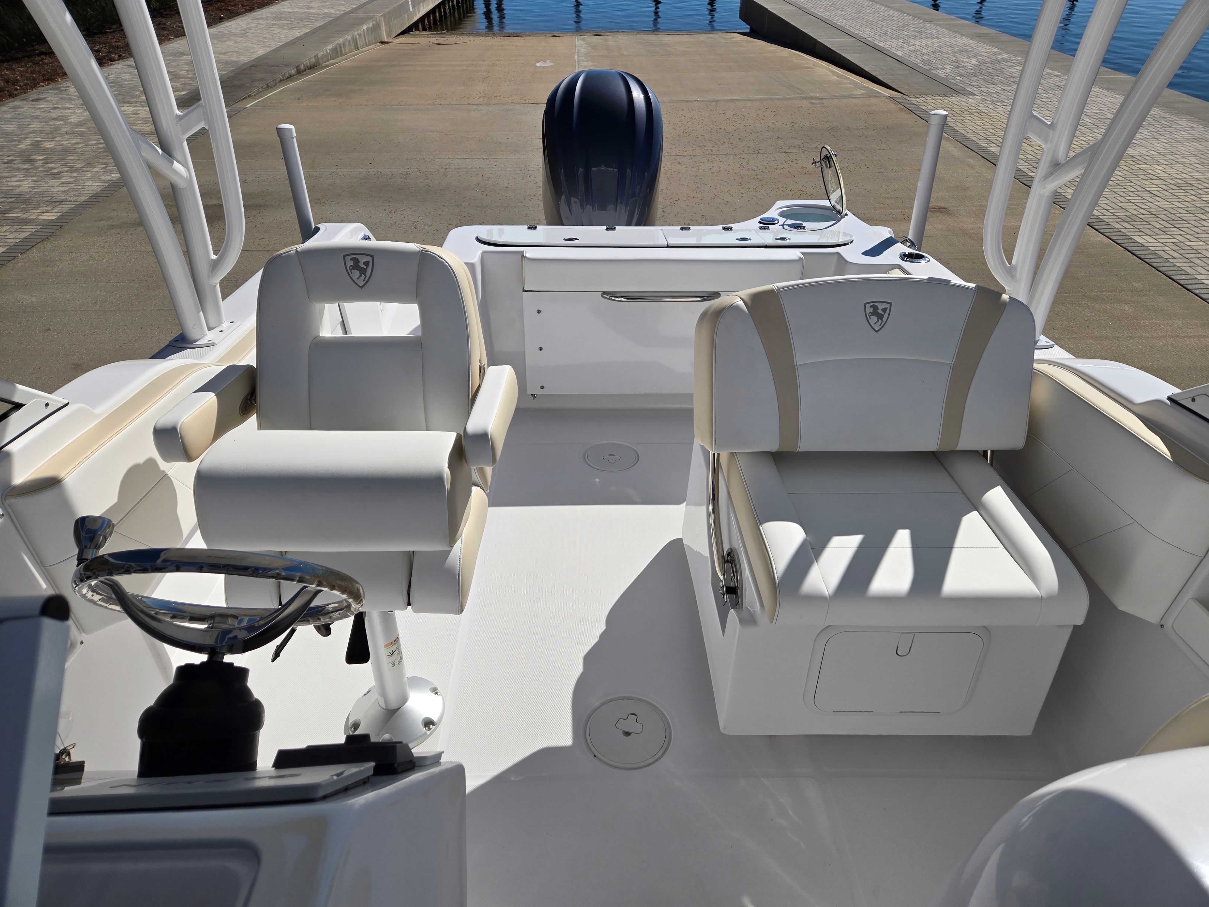Interior of 2024 Century 24 DC boat with white seating.