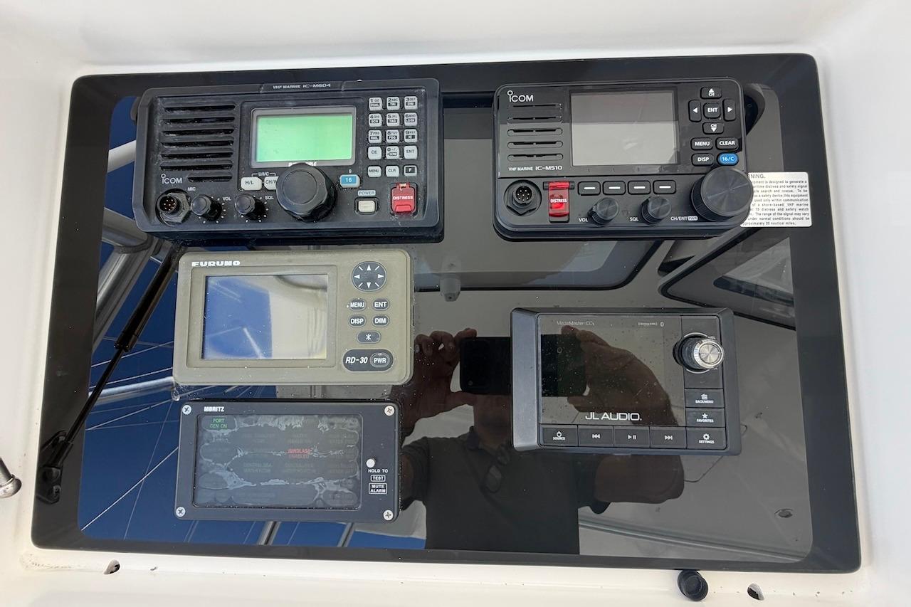 Control panel of a 2012 Viking 50 Convertible yacht with navigation and audio equipment.