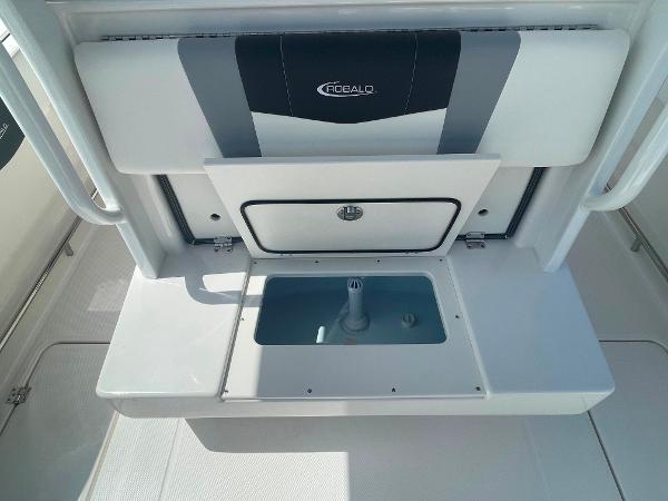 2023 Robalo R270 boat interior with storage compartment.