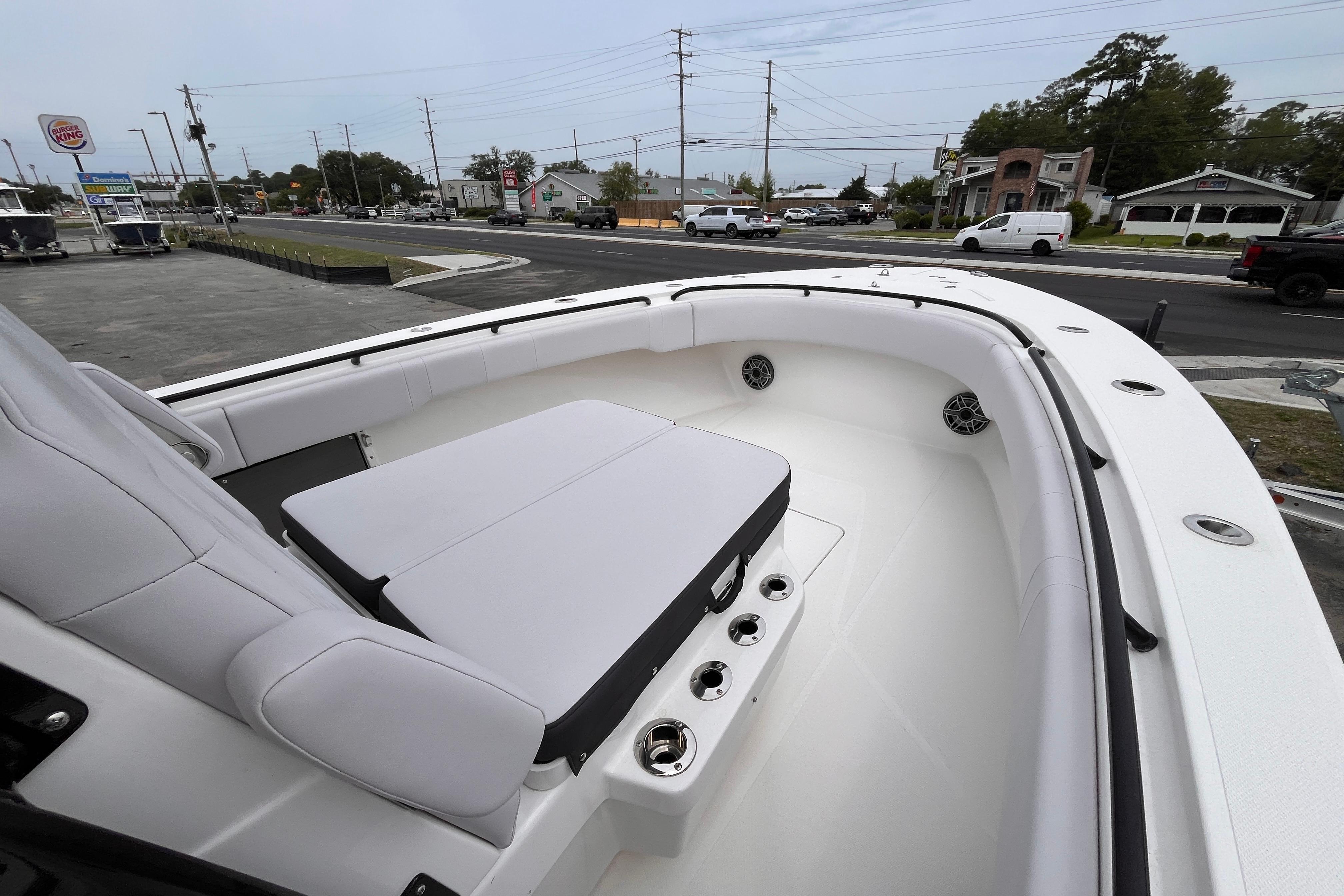 2024 Fountain 34 Tournament Edition boat interior with seating and cup holders.