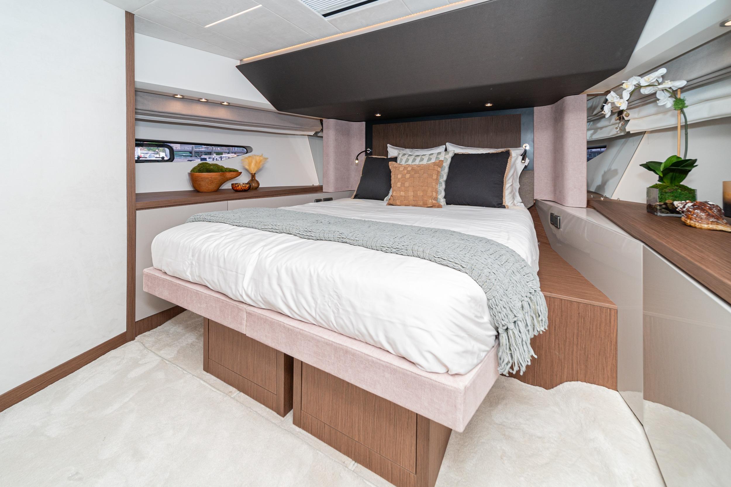 Luxurious bedroom interior of 2024 Prestige X60 yacht with elegant decor and modern design.