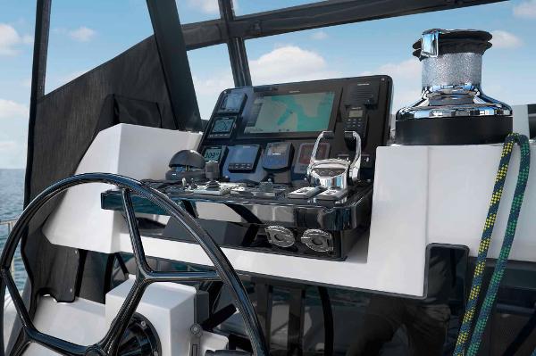 Helm of 2025 Privilege Signature 580 yacht with advanced navigation controls.