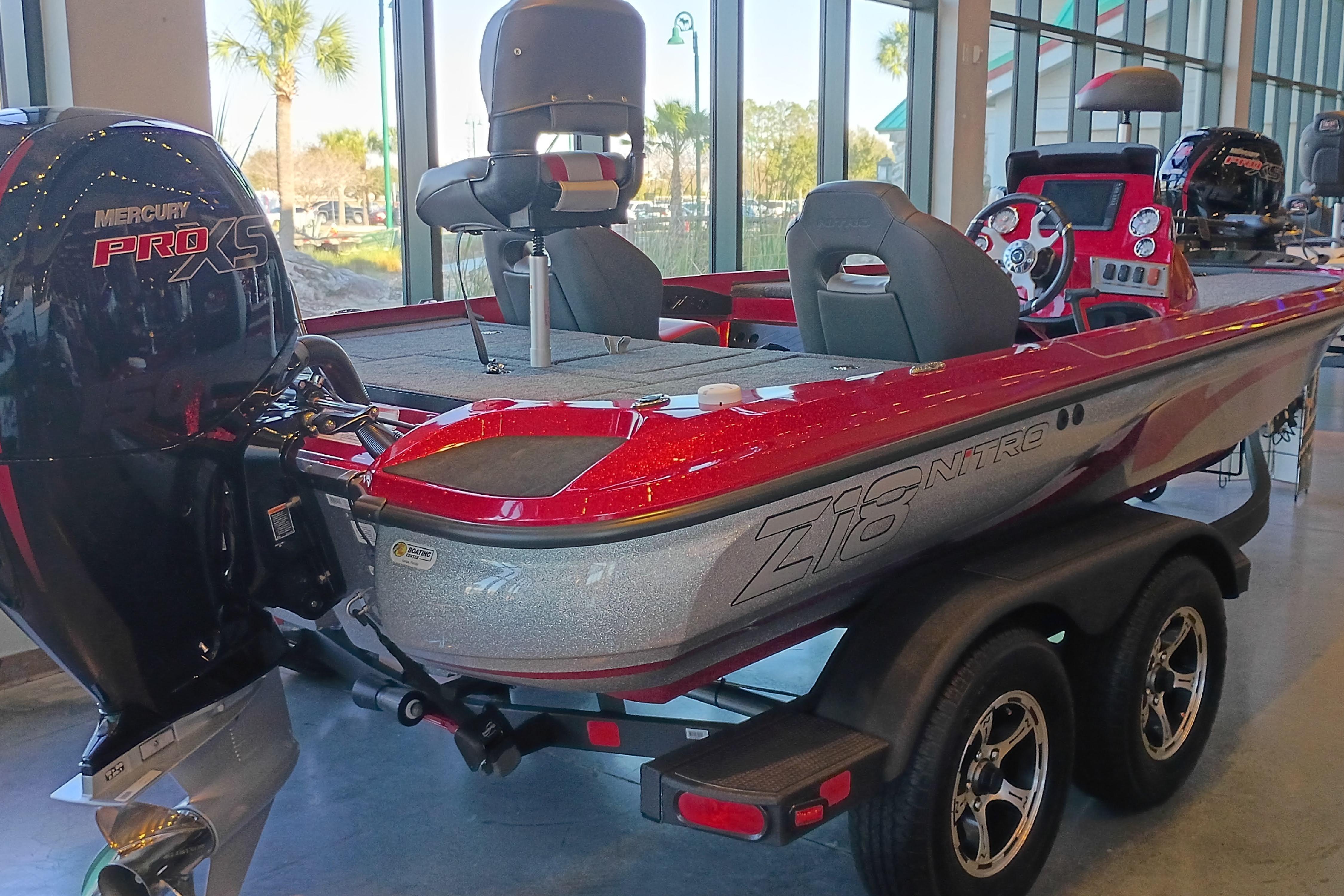 2025 Nitro Z18 Pro boat with Mercury Pro XS engine, displayed indoors.