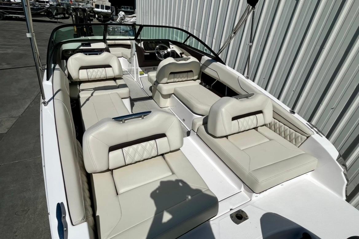 2025 Regal LX2 boat interior with luxurious white seating and modern design.