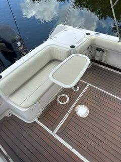 The image shows the cockpit of a 1997 Grady-White Marlin 300 with a bench seat and table.