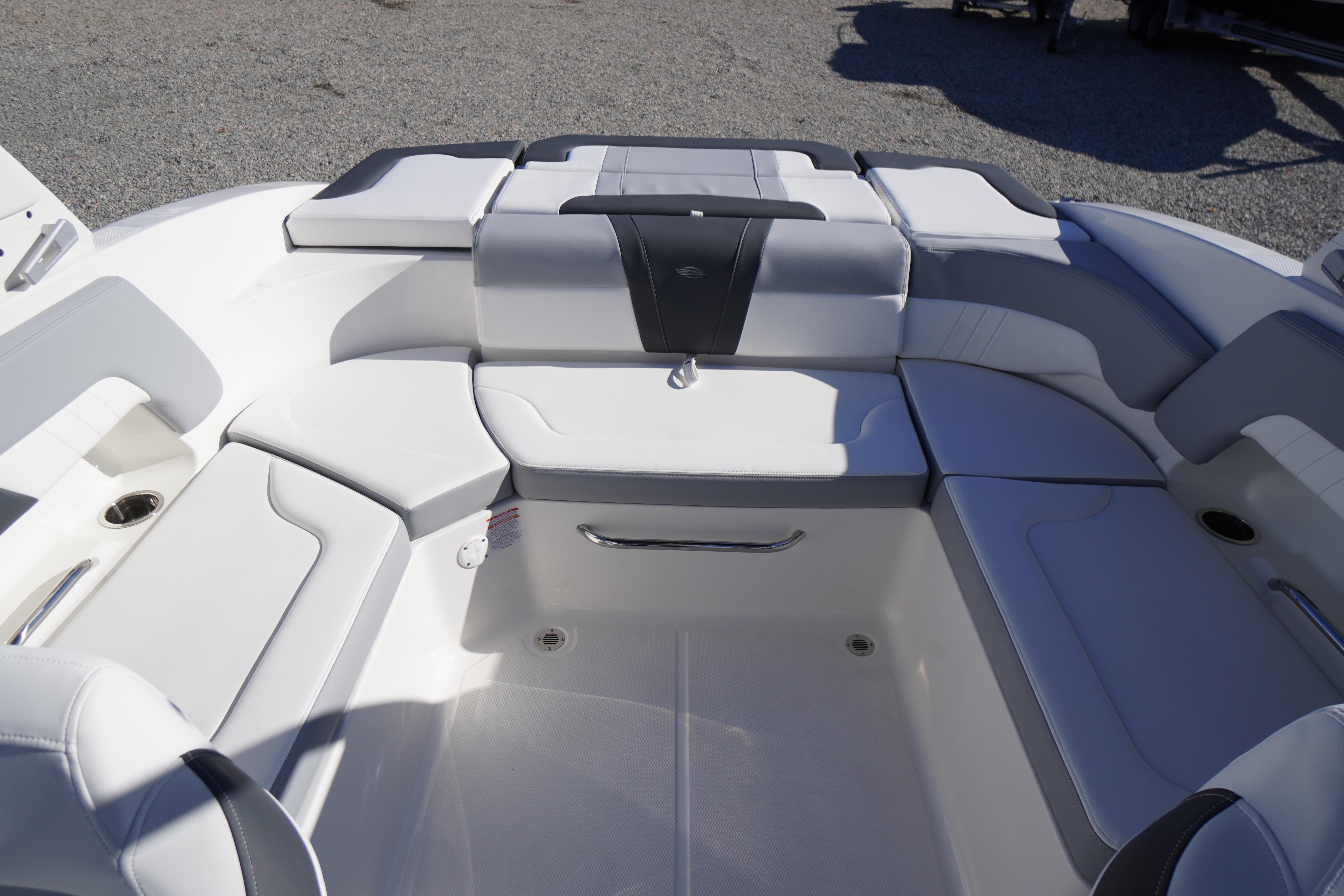 2026 Chaparral 23 SSi boat interior with sleek white seating and modern design.