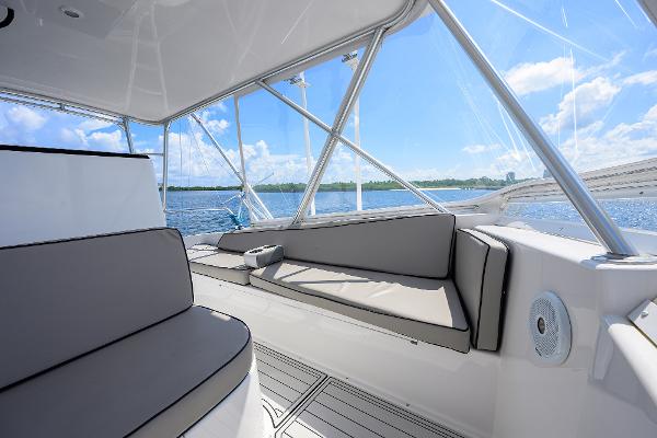 Interior view of 2000 Viking 50 Convertible yacht with cushioned seating and ocean backdrop.