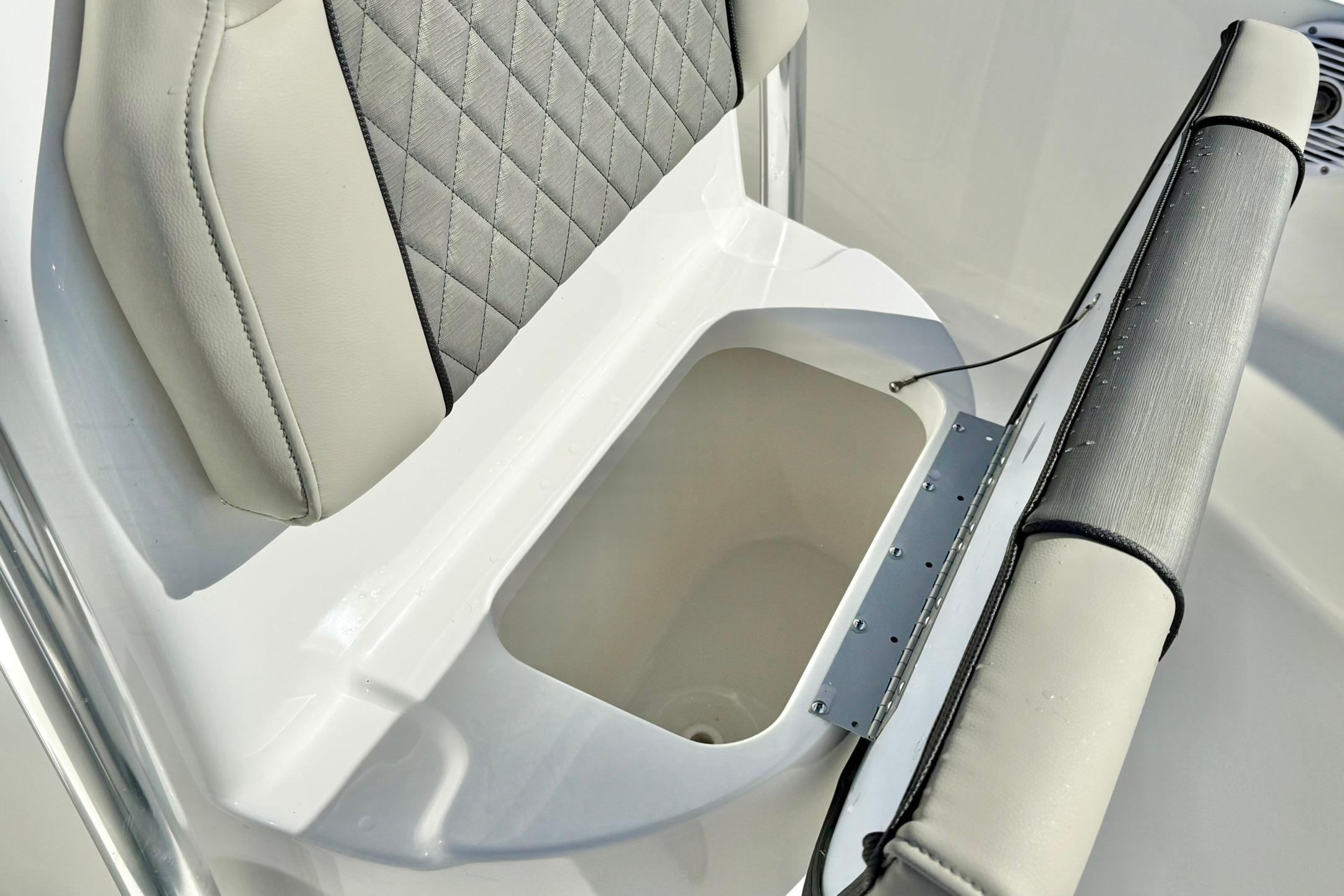 2026 Key West 189 FS boat seat with integrated storage compartment.