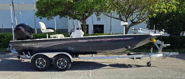 2024 Ranger RB200 boat on trailer, parked outdoors, side view.