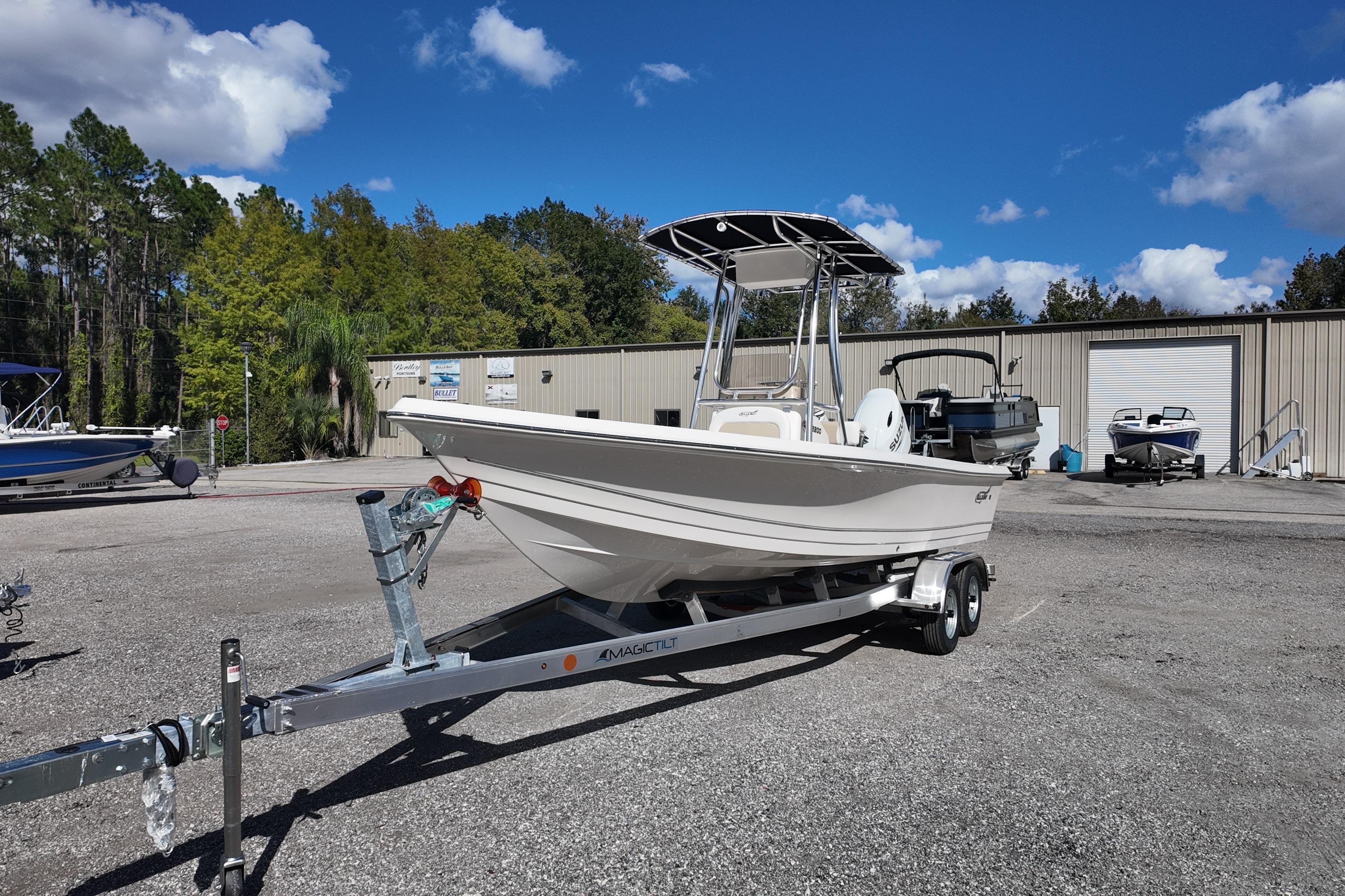 2026 Bulls Bay 2200 boat on trailer, parked outdoors under a clear blue sky.