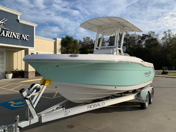 2024 Robalo R202 Explorer boat on trailer outside Marine NC dealership.