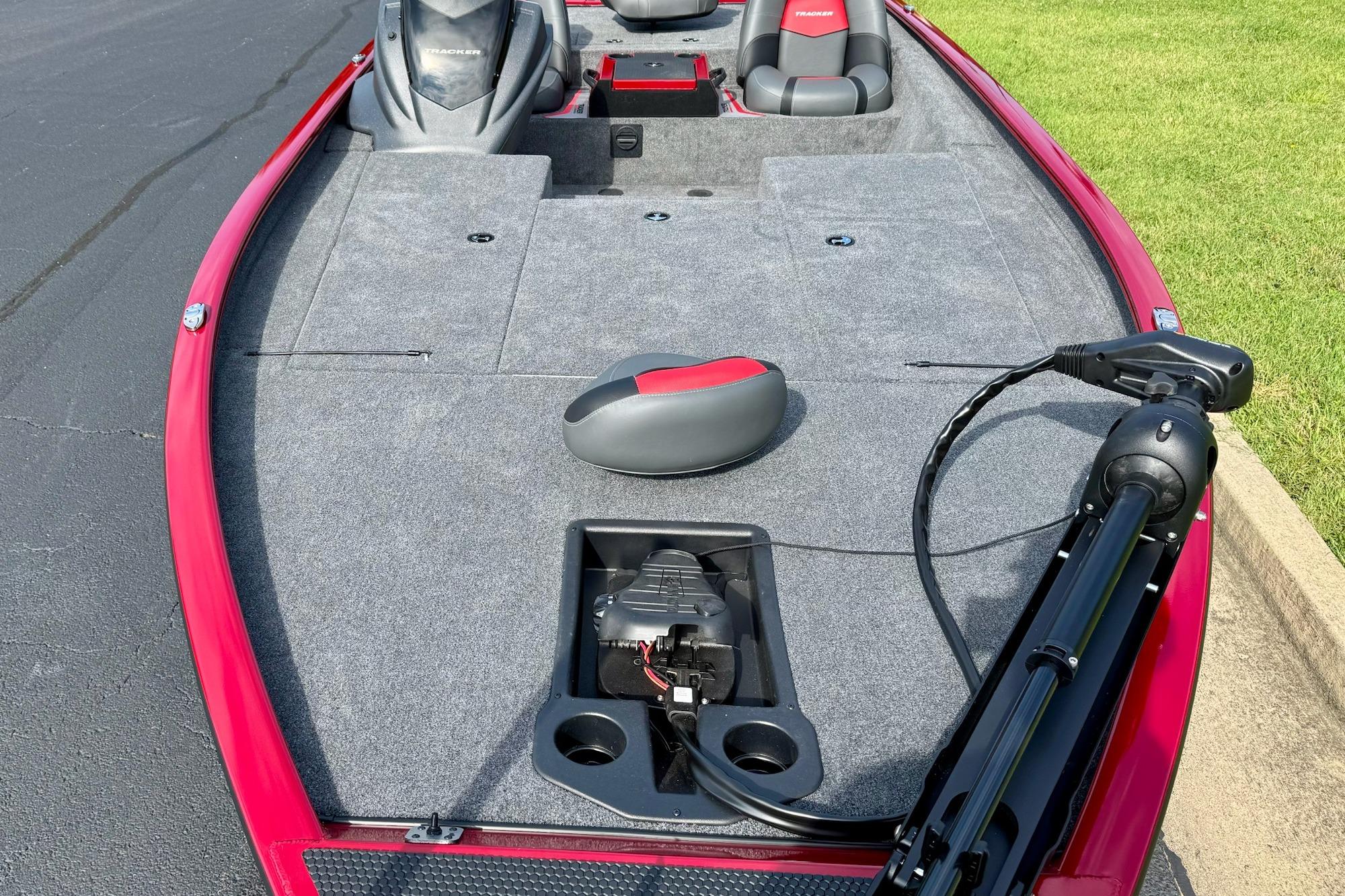 2026 Tracker Savage 215 boat interior with red accents and trolling motor.