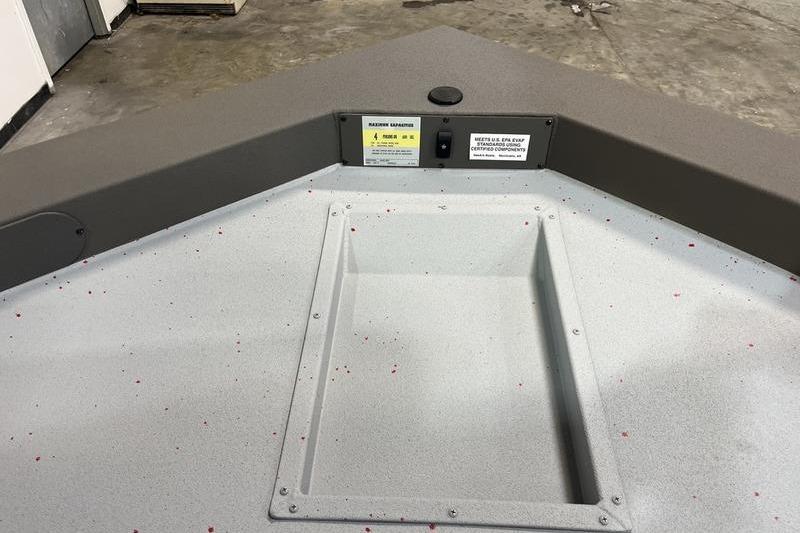 2026 SeaArk Flex 19 Pro boat interior with storage compartment and control panel.