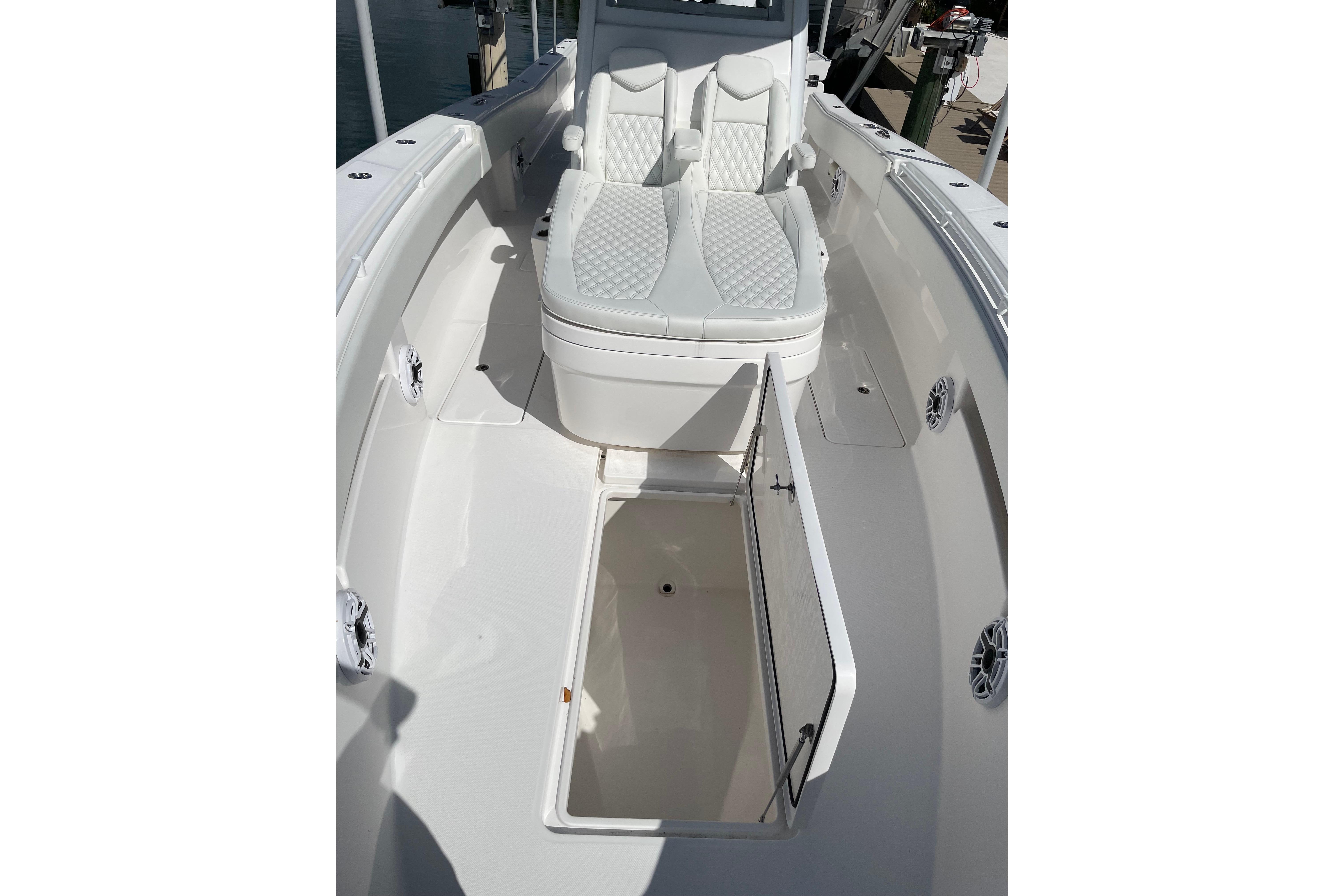 2024 Invincible 36 Open Fisherman boat interior with open storage compartment.