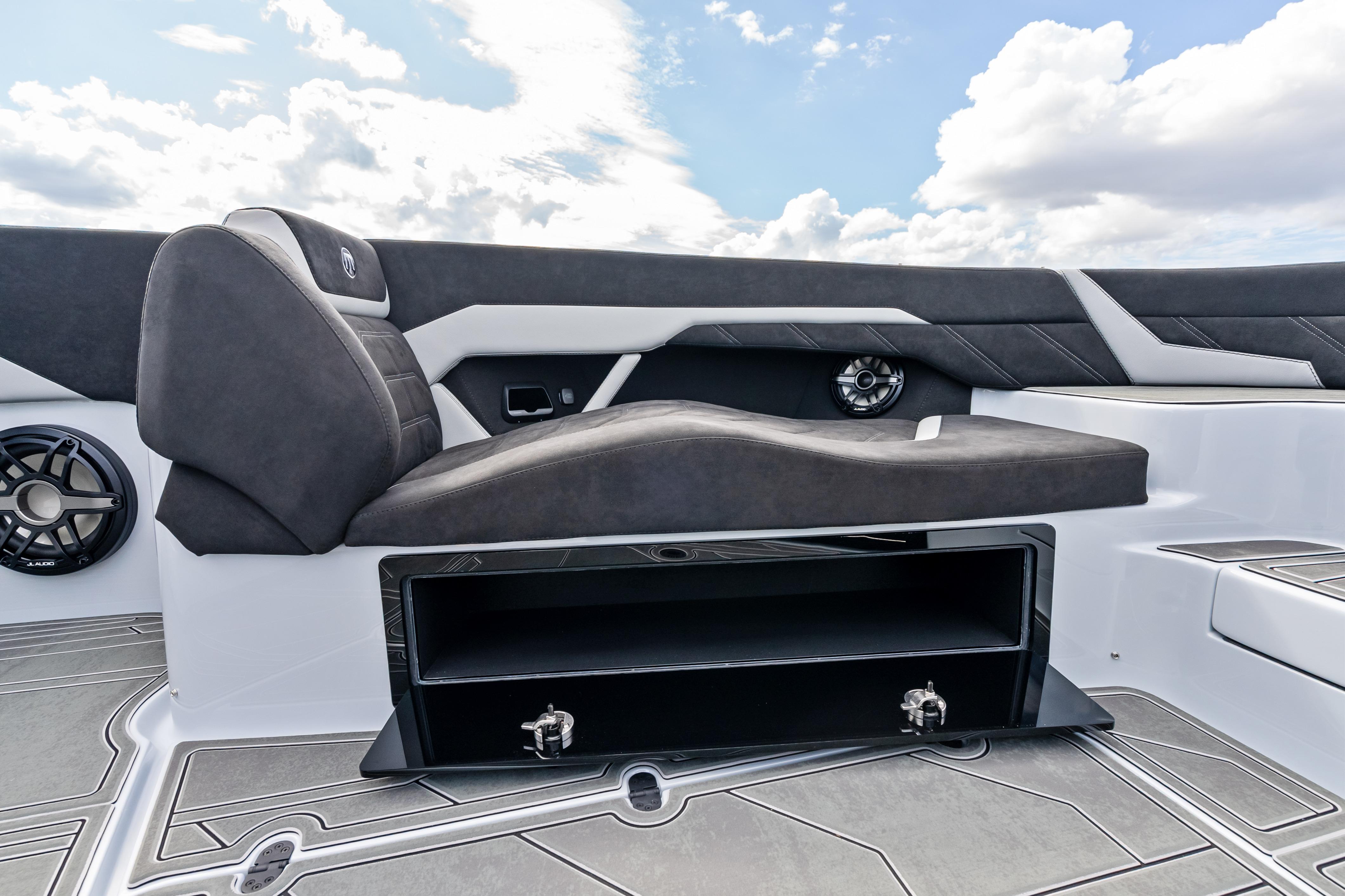 Luxurious seating on the 2027 Mystic Powerboats M4200, featuring sleek design and integrated storage.