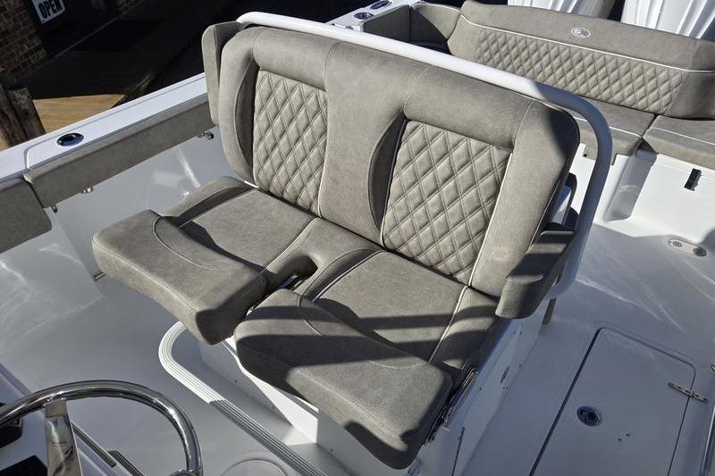 2026 Sea Hunt Ultra 275 Coffin Box boat with cushioned seating and diamond stitching.