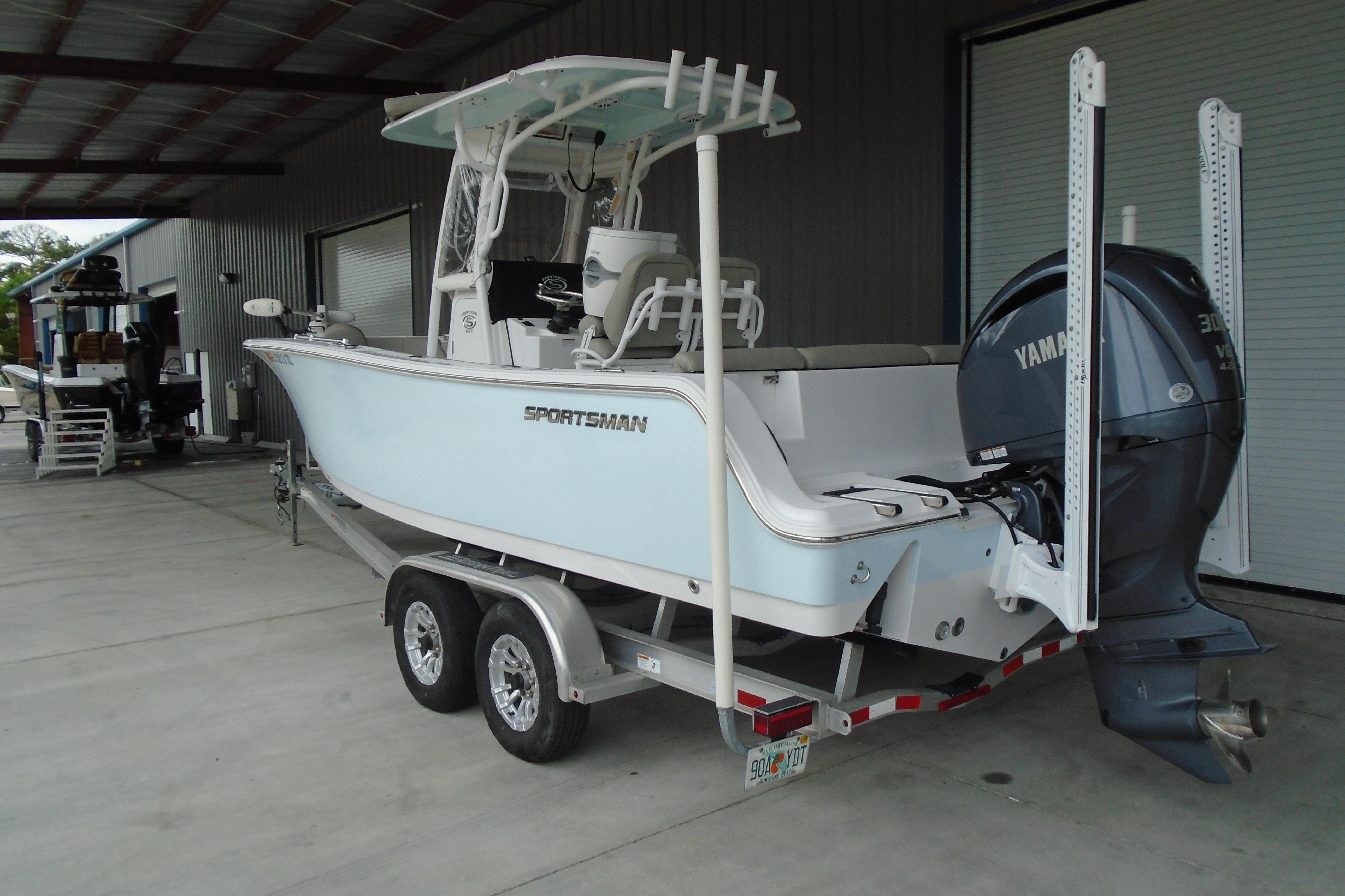 2022 Sportsman Heritage 241 Center Console boat with Yamaha engine on trailer.