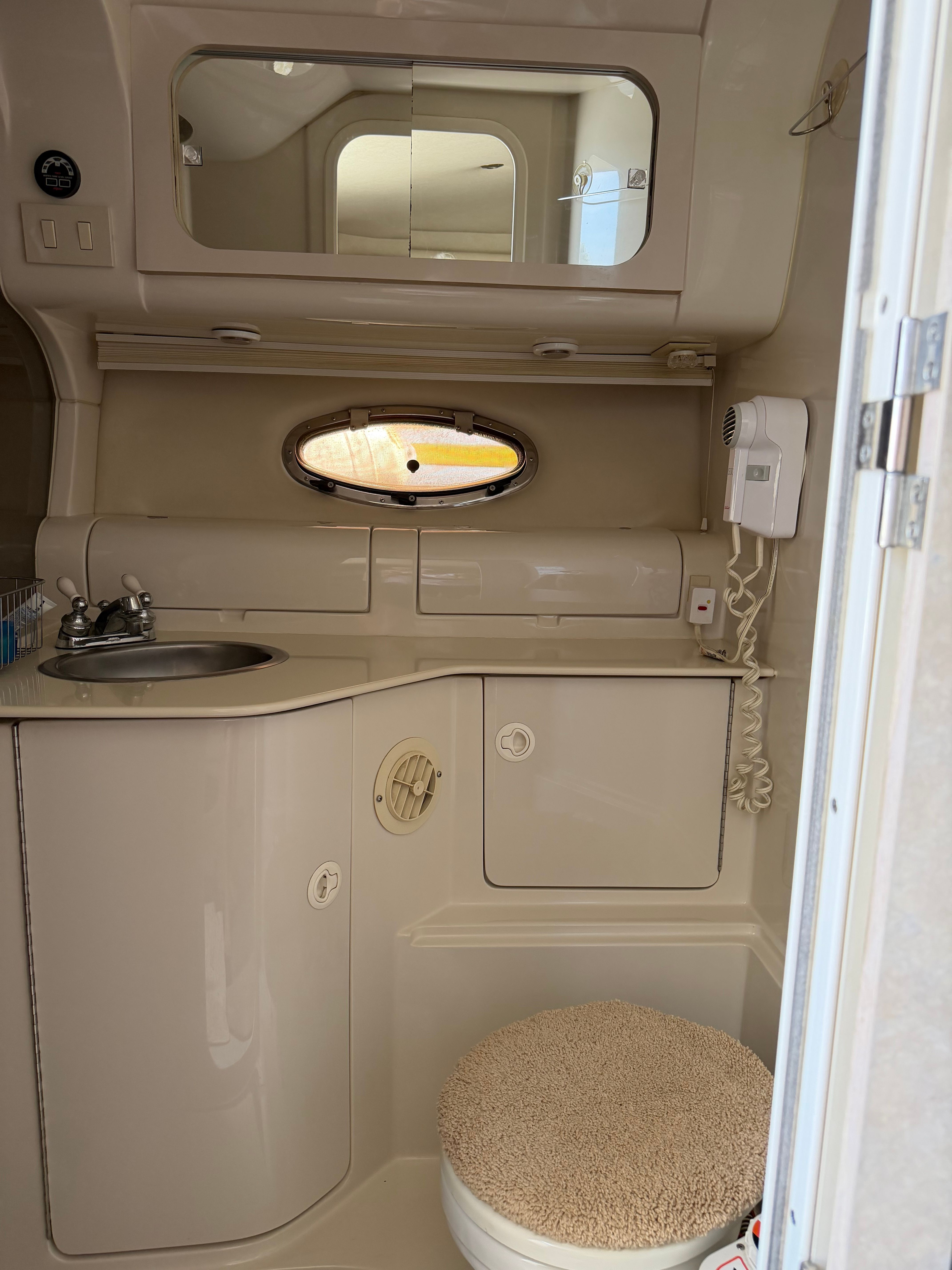 Interior of a 1997 Regal Commodore yacht bathroom.