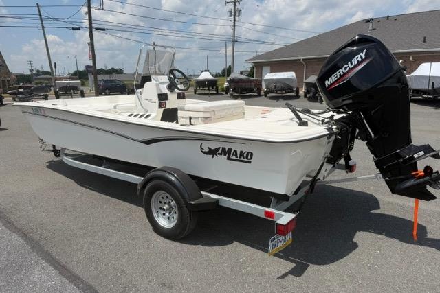 2025 Mako Pro Skiff 17 CC boat with Mercury outboard motor on trailer.