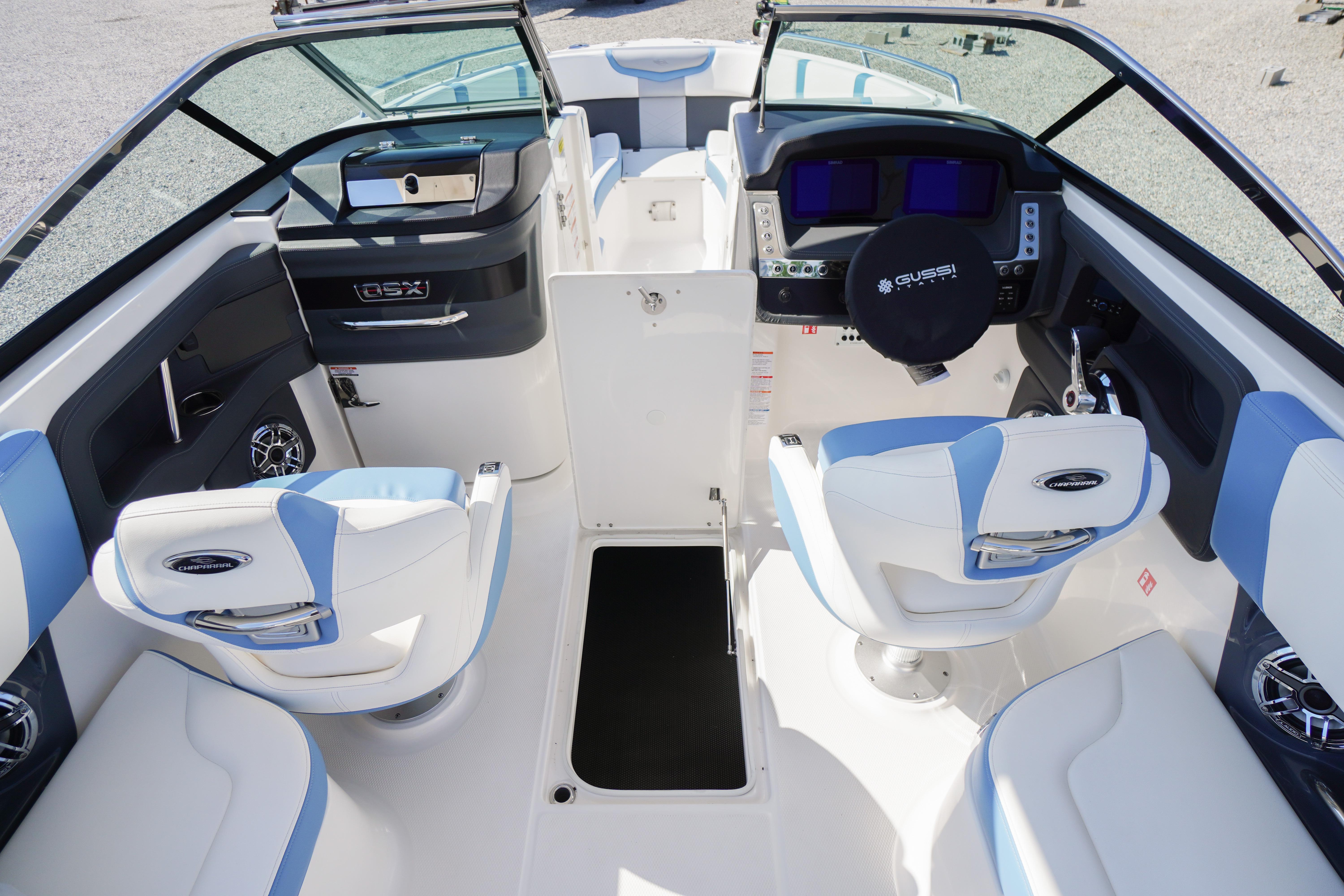 2026 Chaparral 270 OSX boat interior with modern helm, seating, and sleek design.
