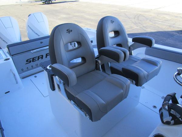 2025 Sea Pro 292 Offshore boat seats, gray leather, dual armrests, modern design.