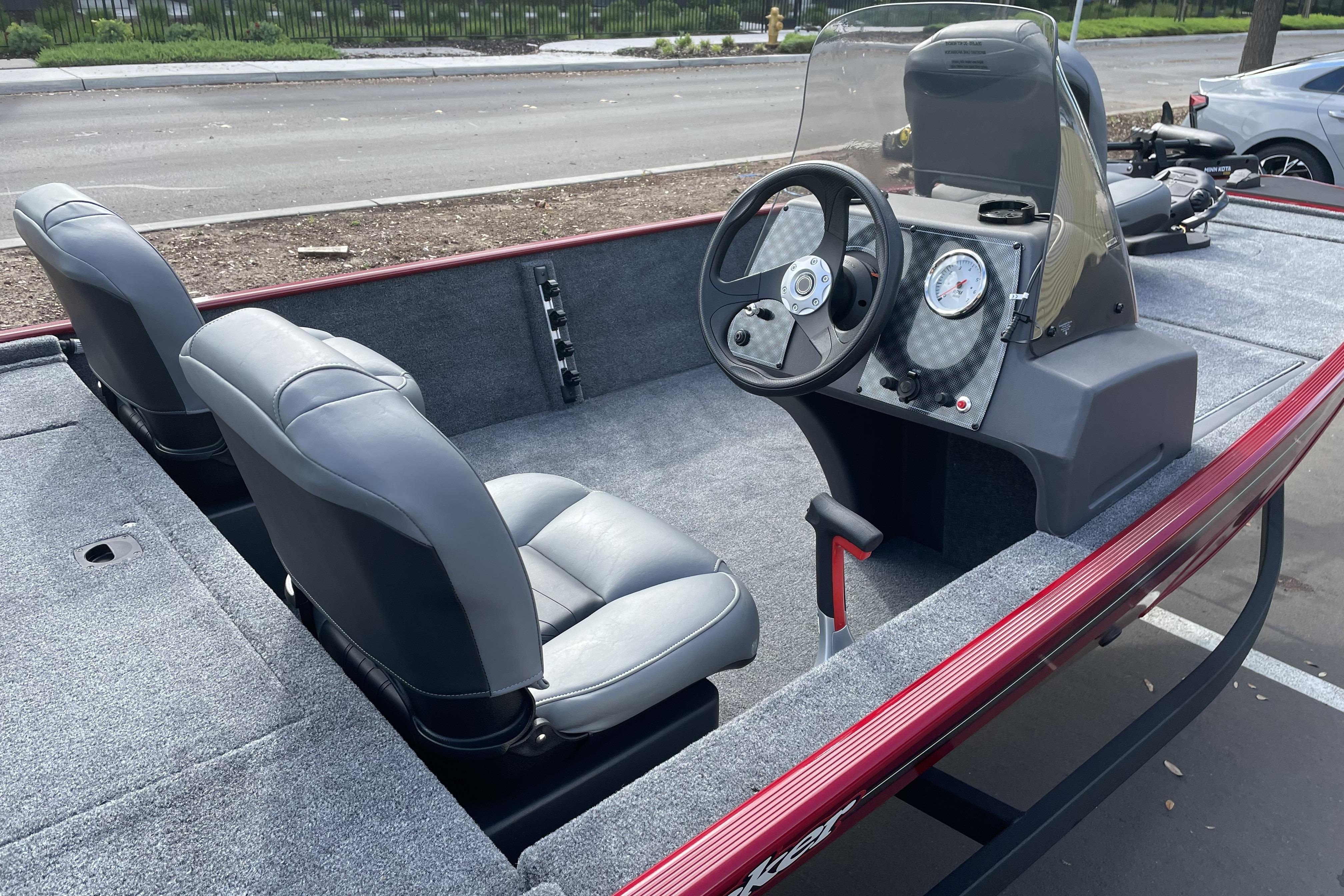2026 Tracker Bass Tracker Classic XL boat interior with steering console and seating.