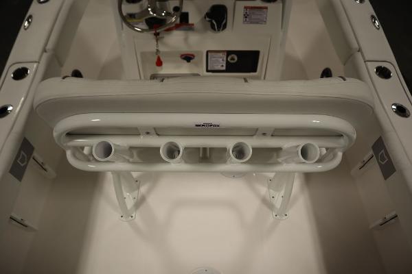 2025 Sea Fox 228 Commander boat interior with rod holders and steering console.