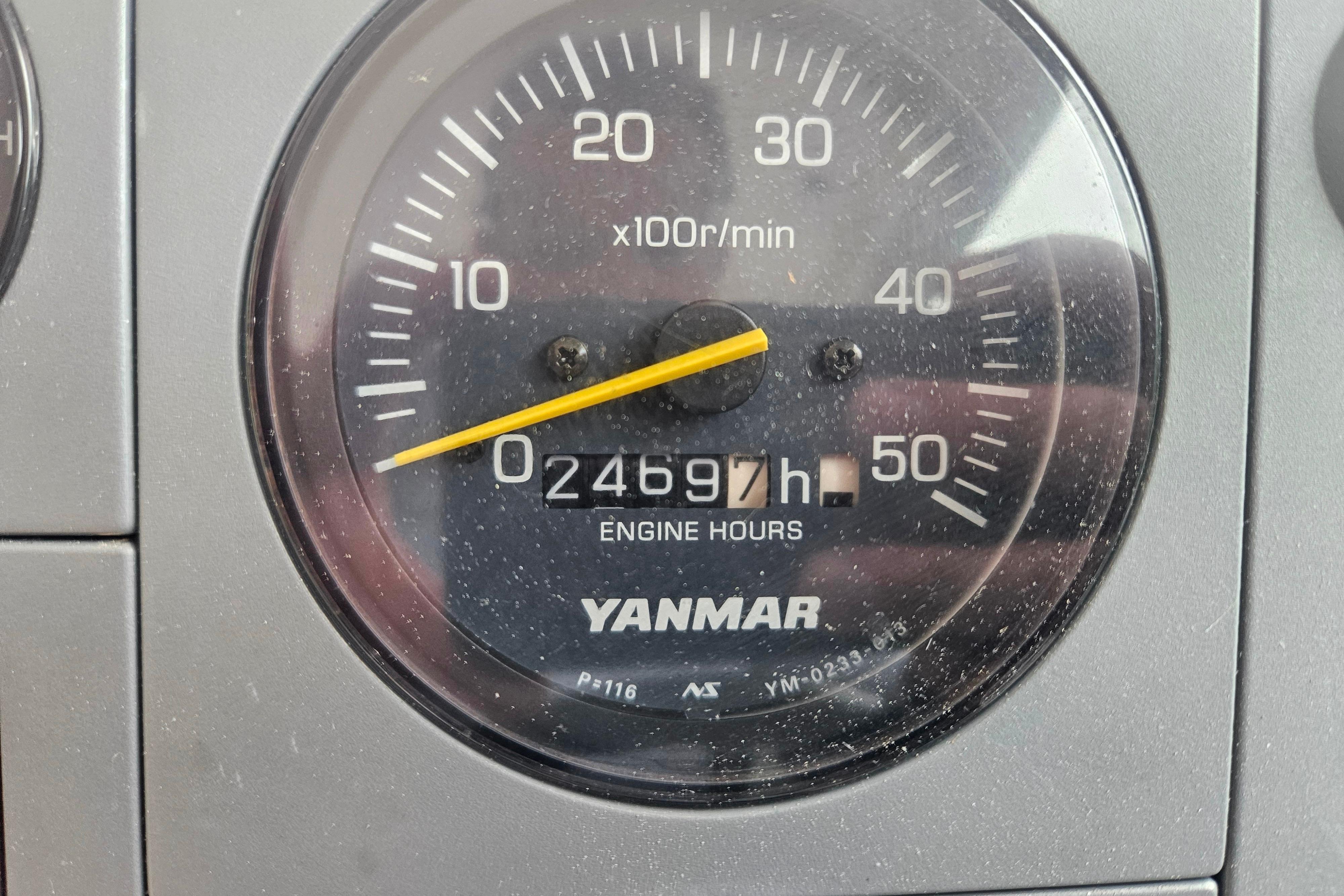 Close-up of Yanmar engine hour meter showing 2469.7 hours on Albin 28 Tournament Express, 1999.