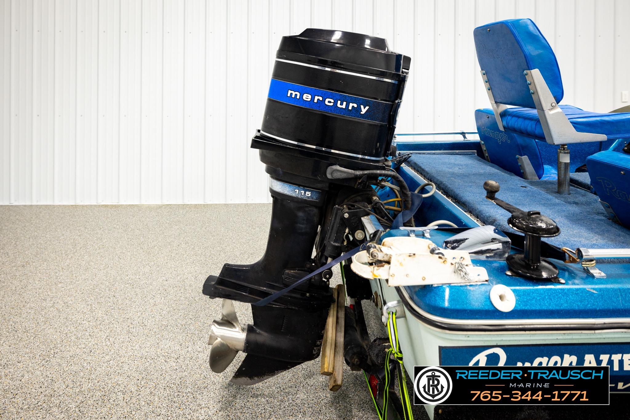 1980 Ranger 175 VS boat with Mercury outboard motor in showroom.
