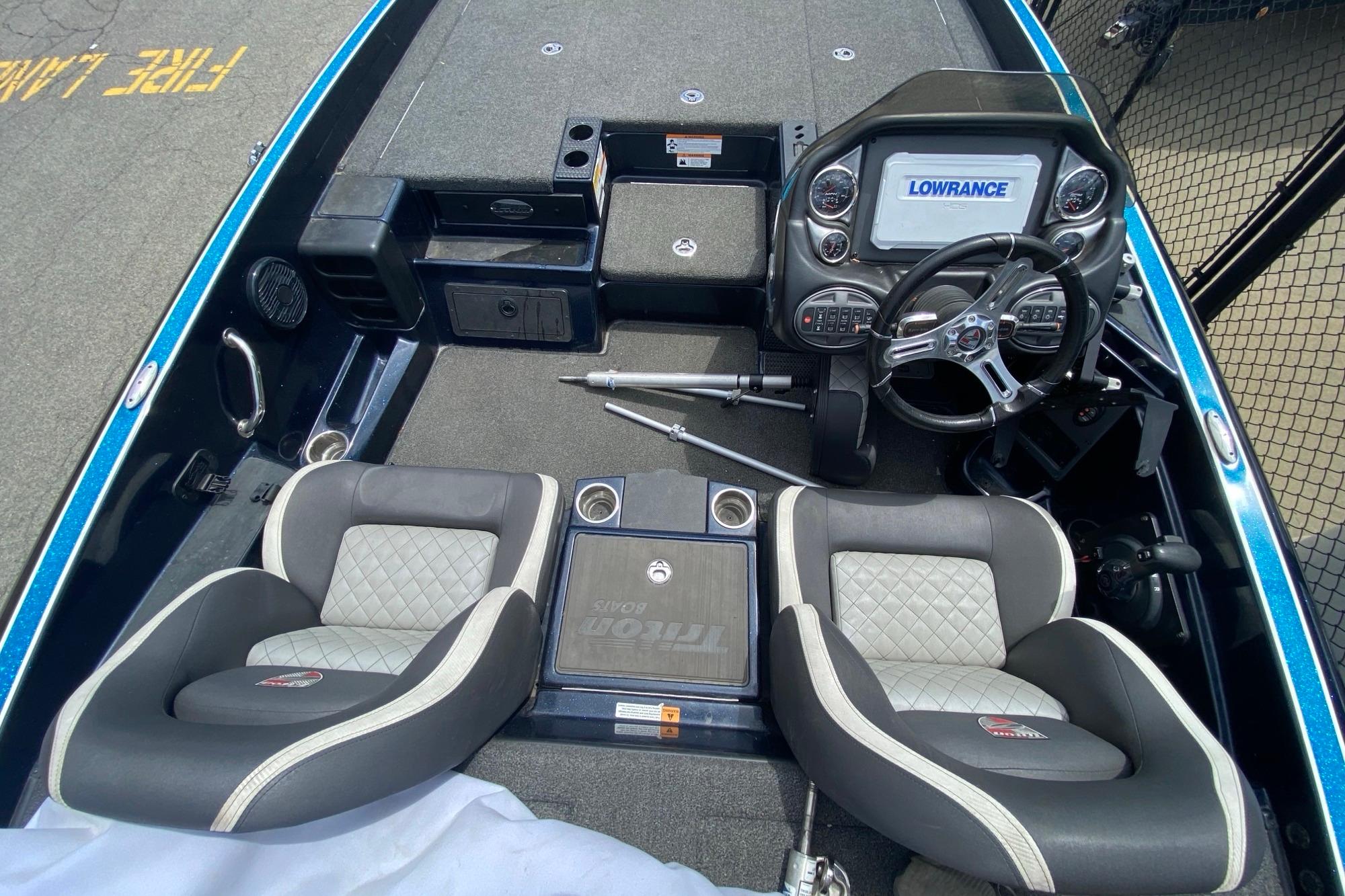 2020 Triton 20 TrX Patriot boat interior with dual seats and advanced dashboard.