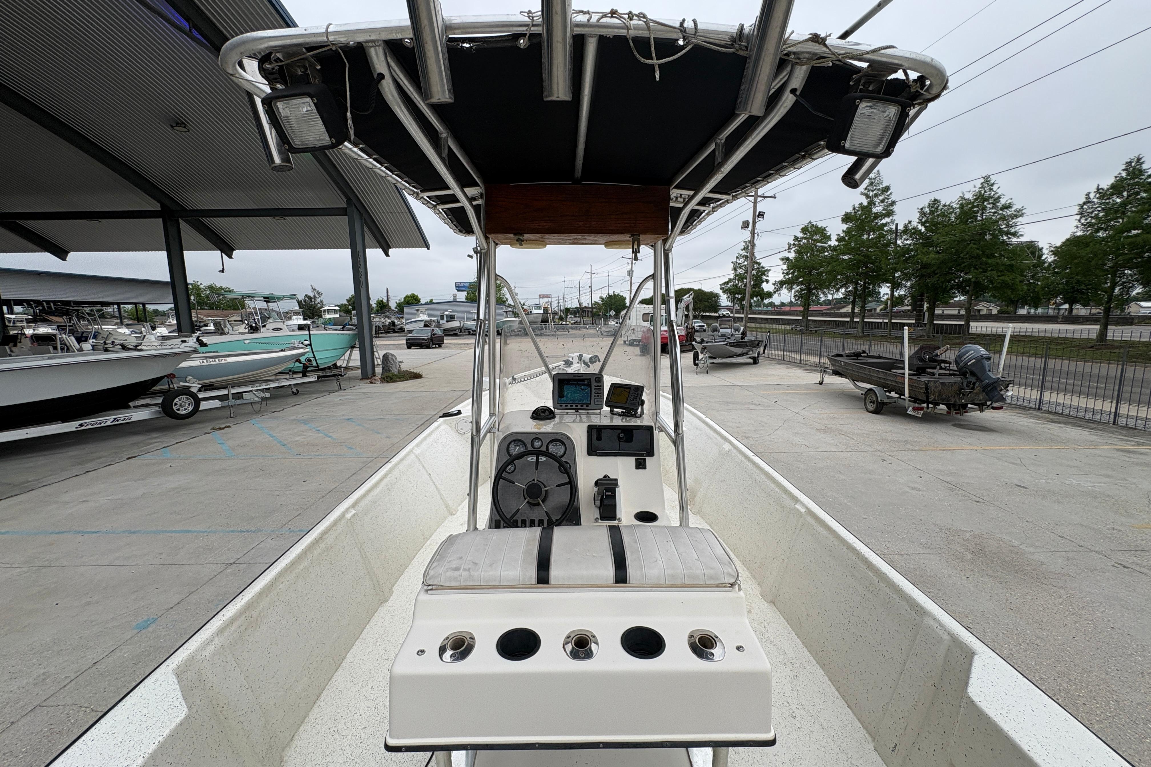 1998 Hydra-Sports 22 Ocean CC boat interior with steering console and canopy.