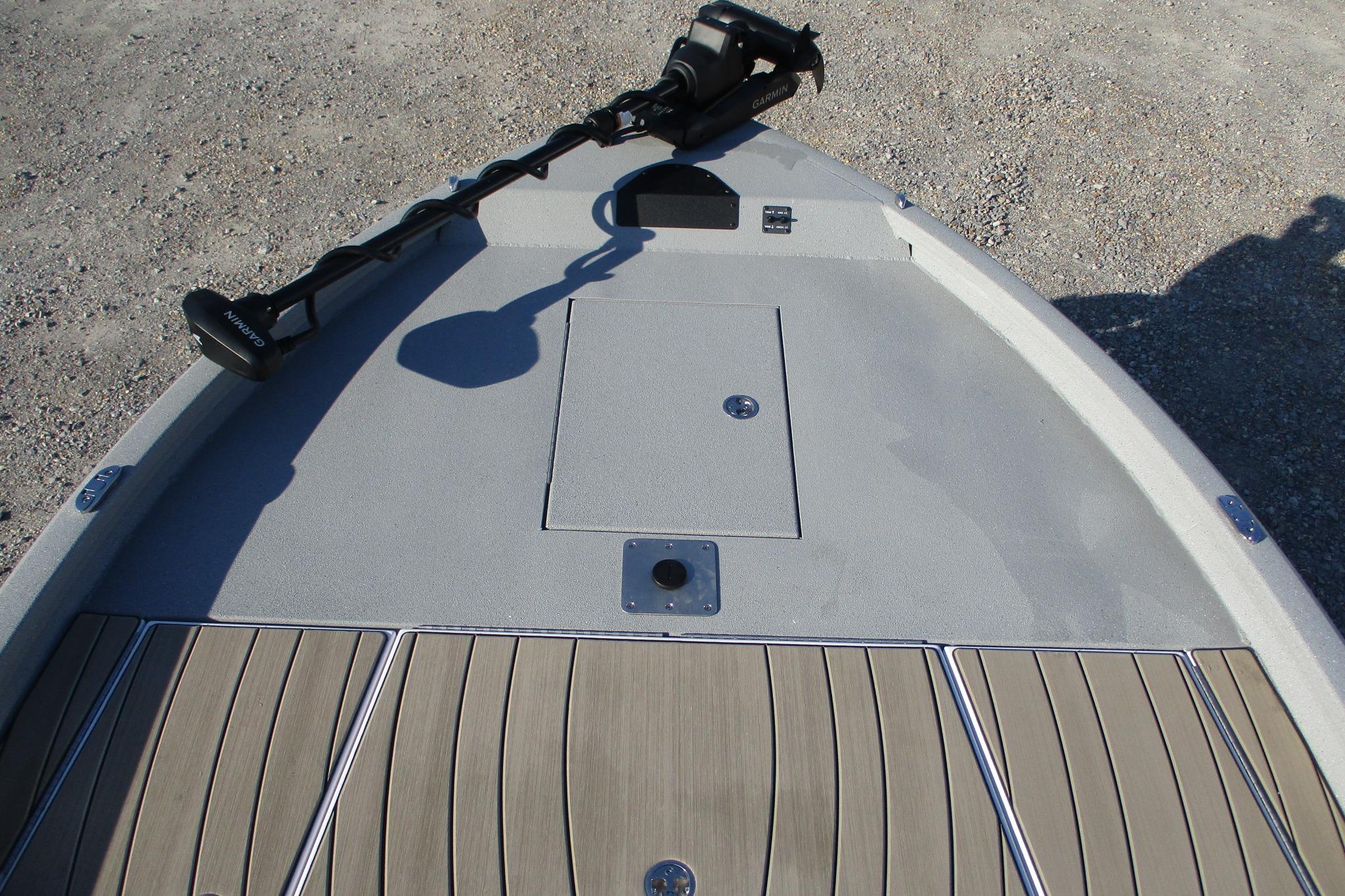 2026 Vexus ACX2210 boat deck with Garmin trolling motor, featuring sleek design and wood finish.