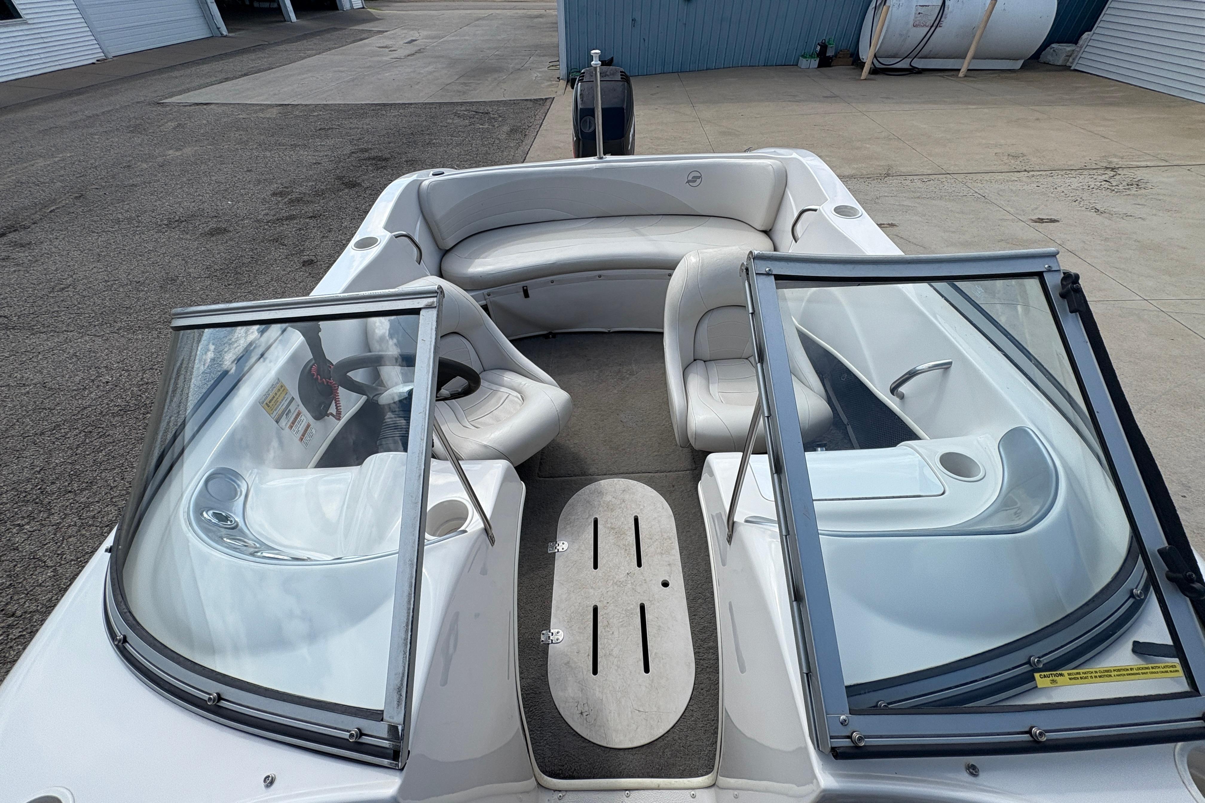 2005 Starcraft C-Star 1700 OB boat interior with seating and windshield.