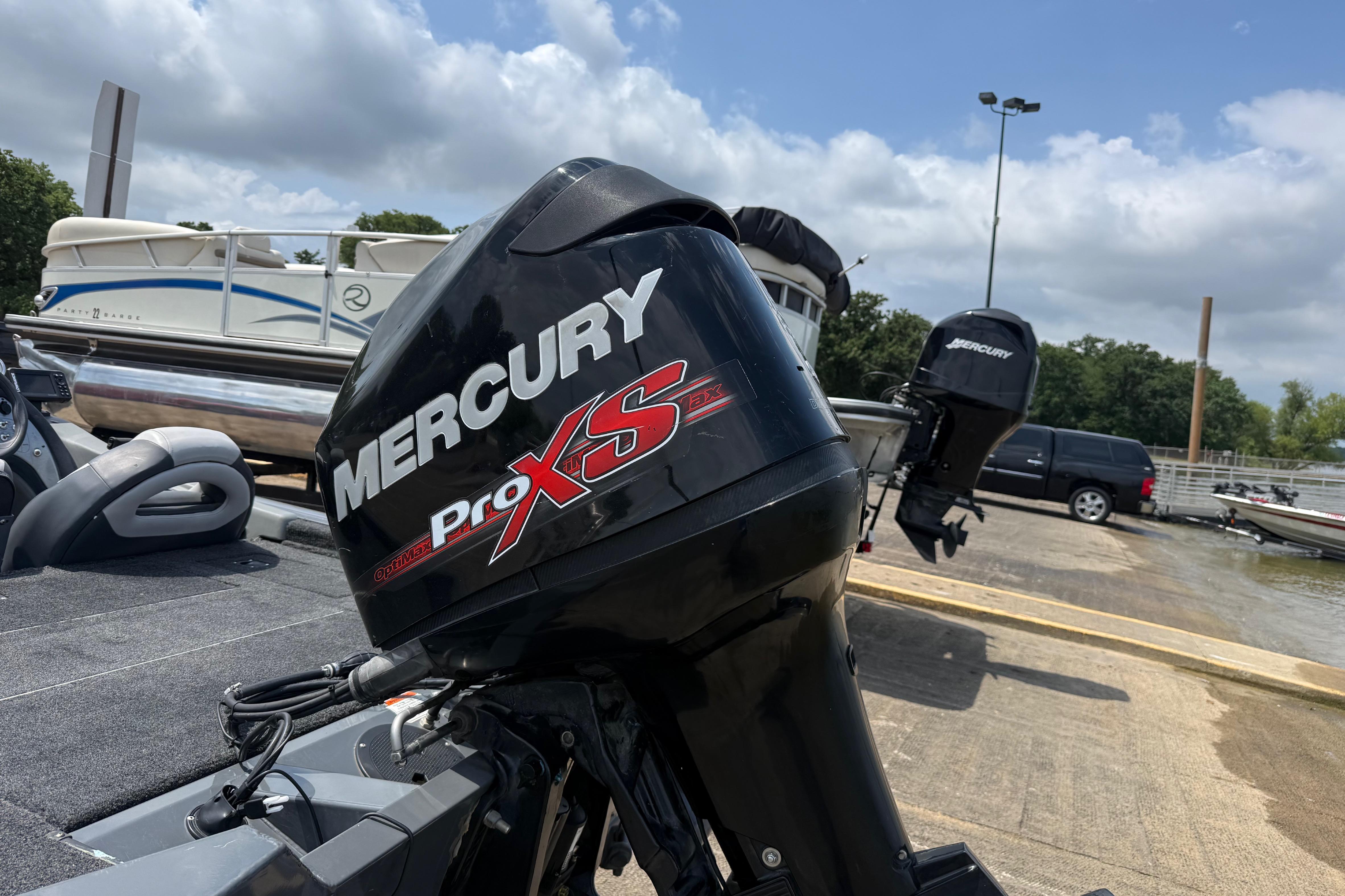 2015 Tracker Pro Team 190 TX with Mercury Pro XS engine at a boat launch.