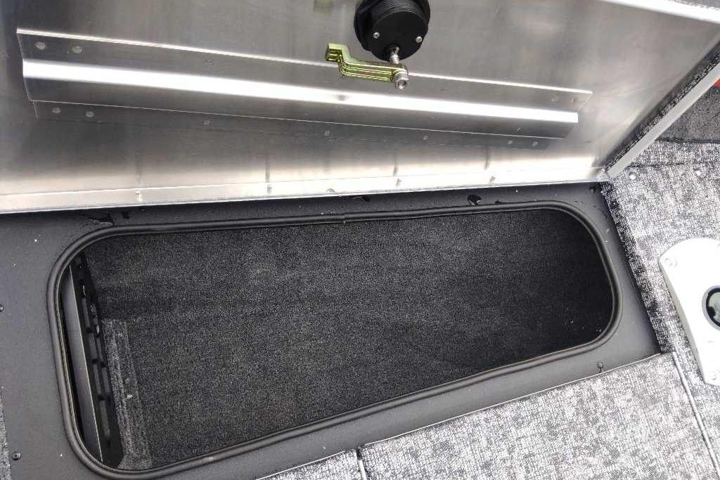 Open storage compartment in 2026 Tracker Pro Team 175 Crappie Edition boat.