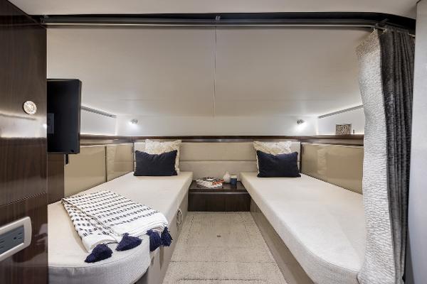 Manufacturer Provided Image: Interior cabin of 2023 Sea Ray Sundancer 320 with twin beds and modern decor.
