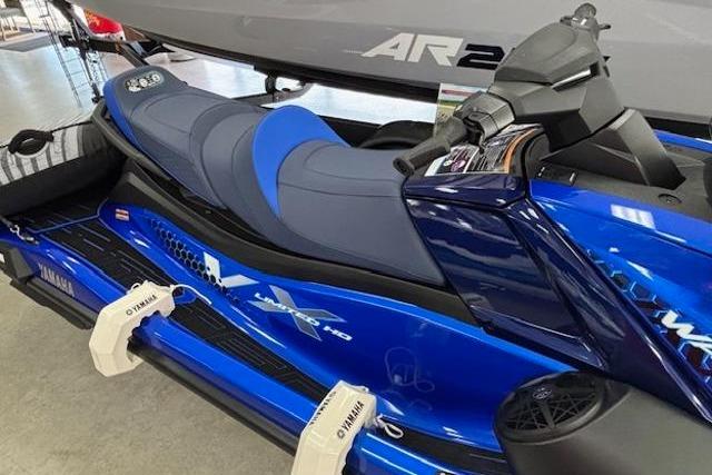 2026 Yamaha WaveRunner VX Limited HO in vibrant blue, displayed indoors.