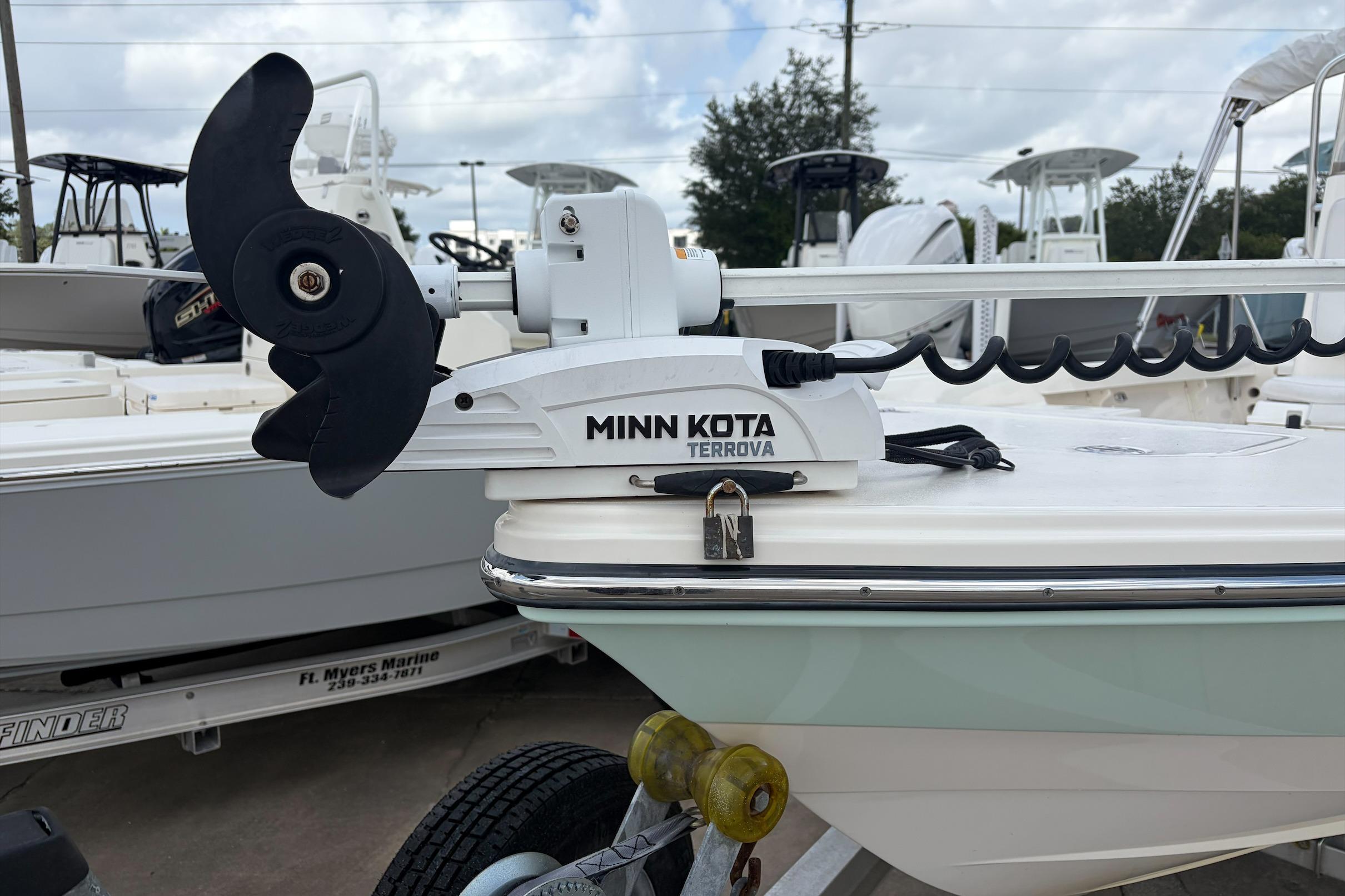 Minn Kota Terrova motor on 2017 Pathfinder 2200 TRS boat, parked at marina.