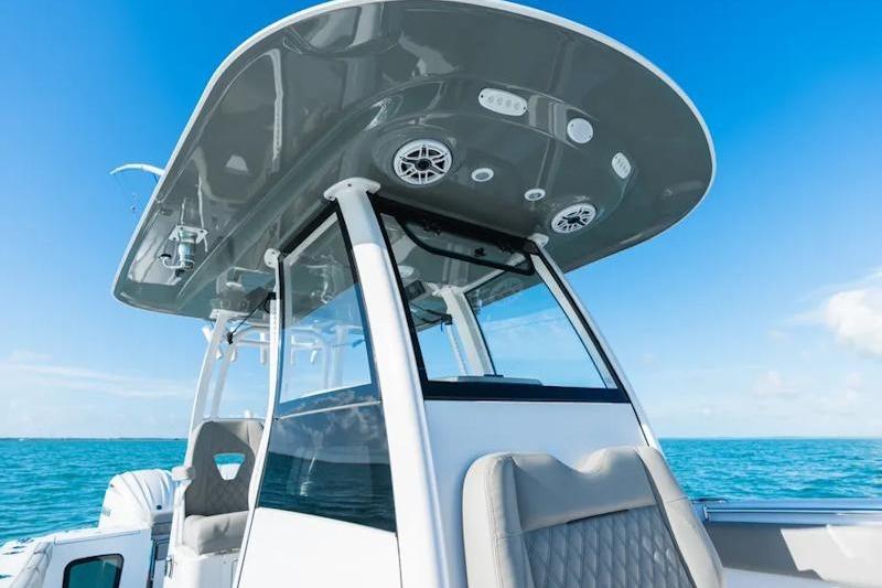 2026 Sportsman Open 282 Center Console boat on clear blue ocean.
