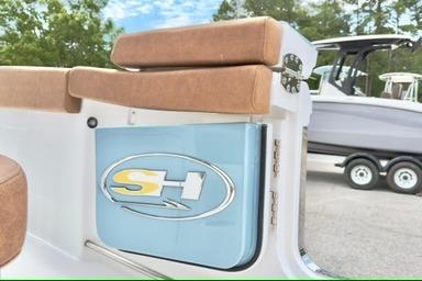 2026 Sea Hunt Ultra 255 SE boat interior with logo and seating detail.