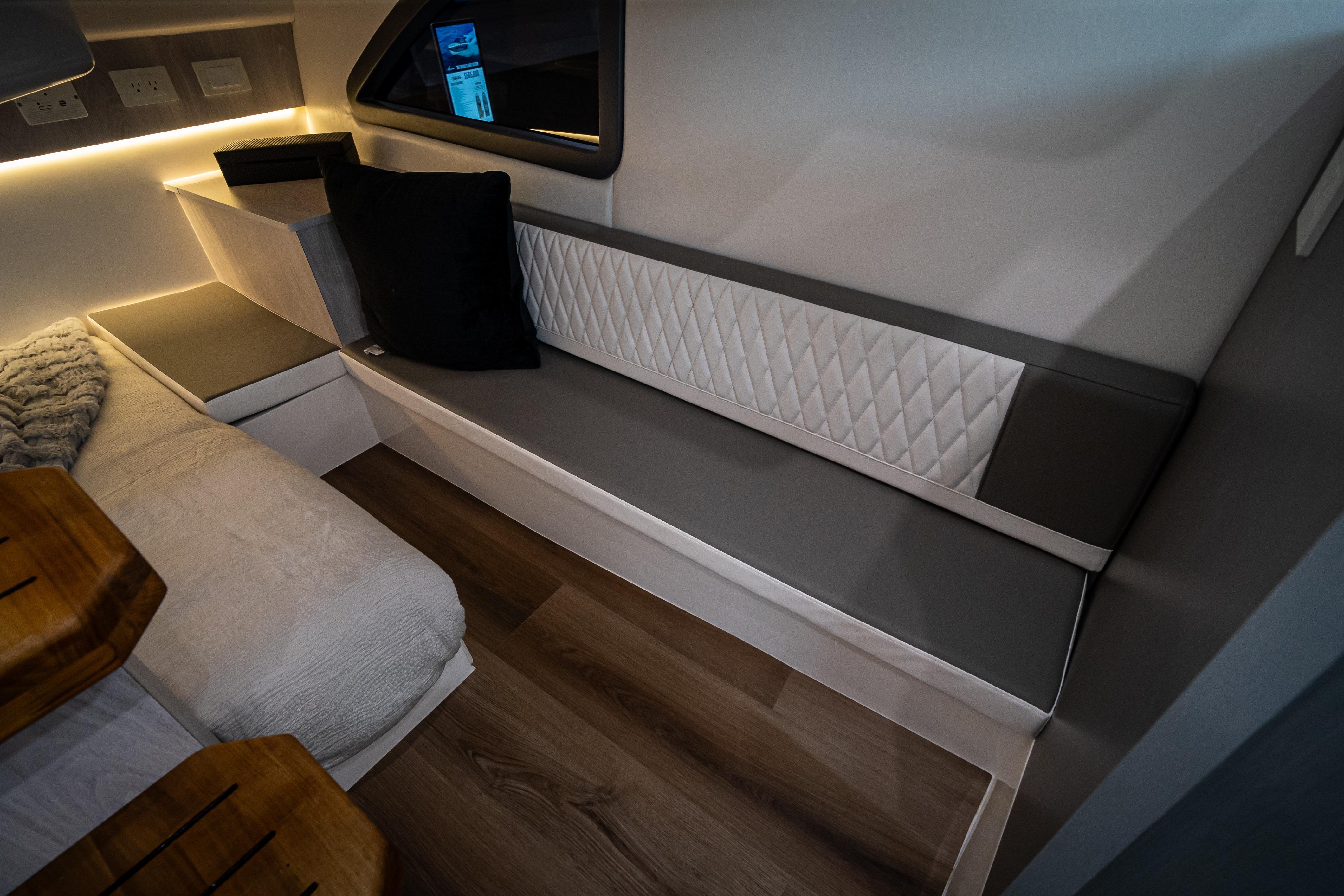 Modern interior of Hanover 347, 2026 model, featuring sleek seating and ambient lighting.