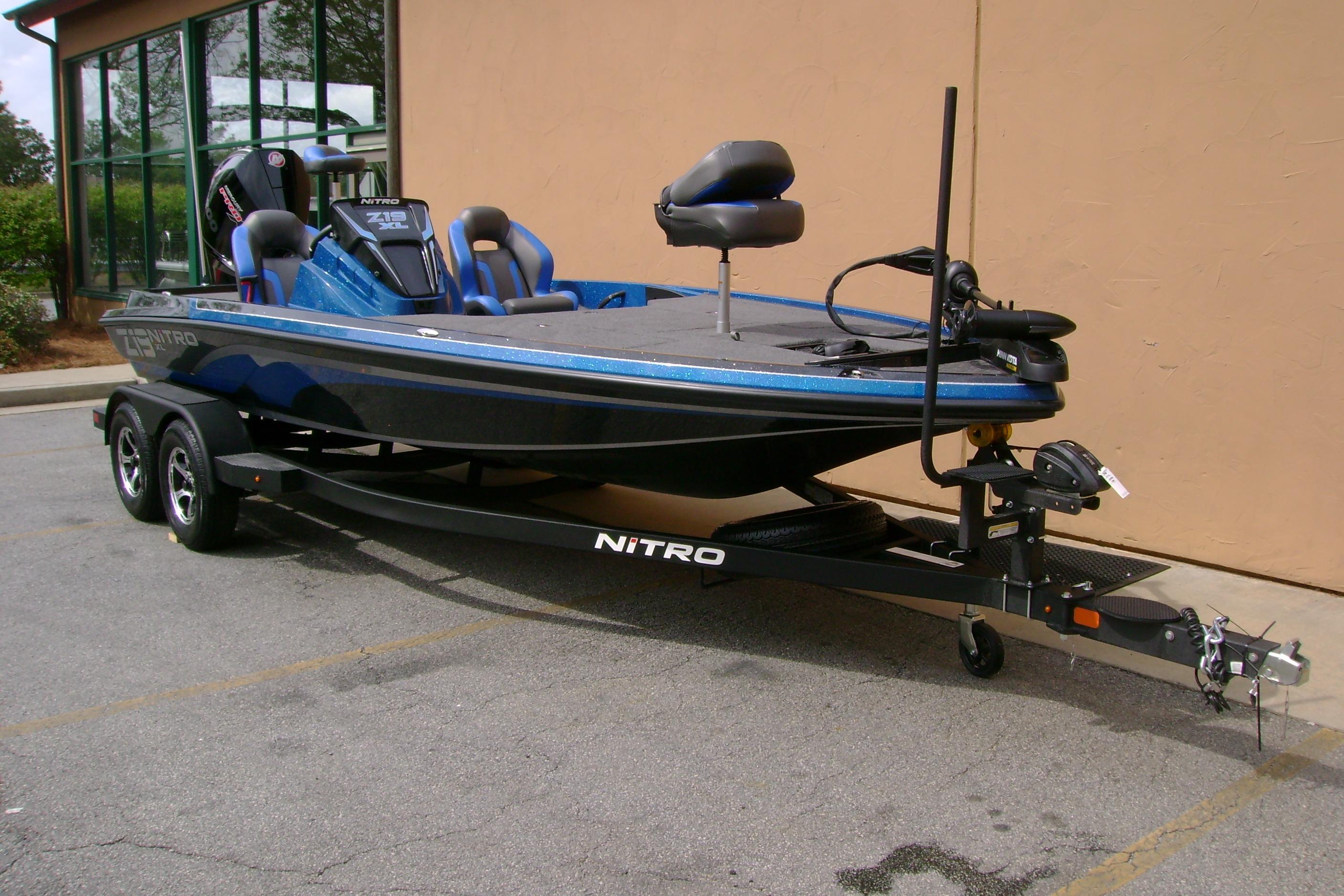 2026 Nitro Z19 XL bass boat on trailer, parked outdoors.